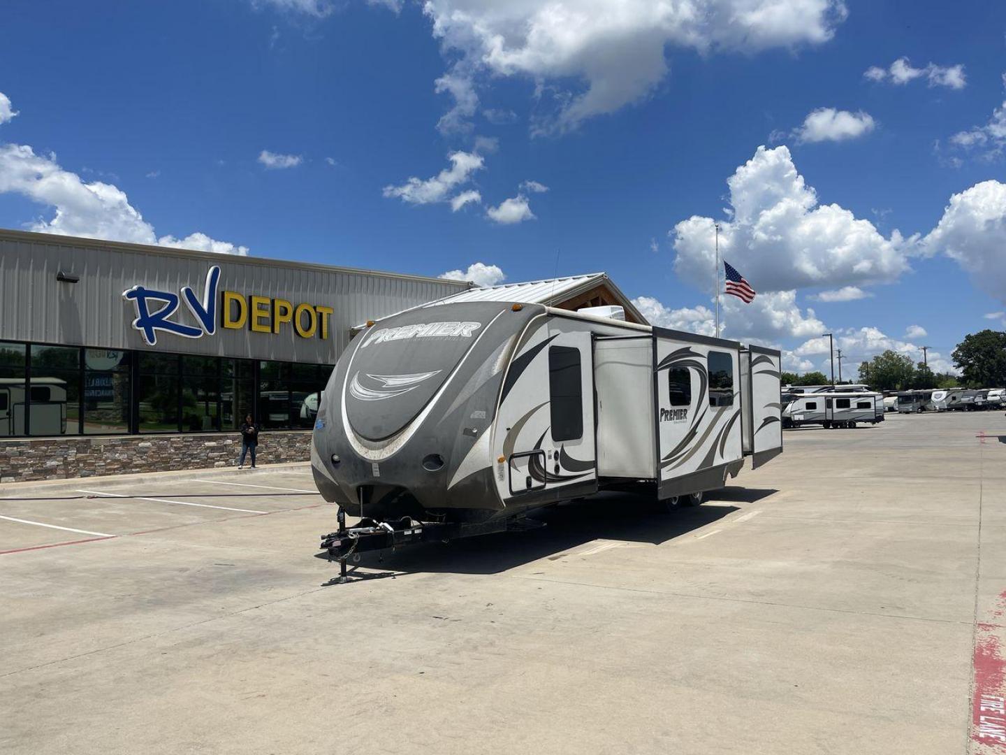 2014 TAN BULLET PREMIER 31BHPR - (4YDT31B25ED) , Length: 35.33 ft. | Dry Weight: 6,457 lbs. | Gross Weight: 8,000 lbs. | Slides: 2 transmission, located at 4319 N Main St, Cleburne, TX, 76033, (817) 678-5133, 32.385960, -97.391212 - In search of a nice-sized, lightweight travel trailer that can still accommodate many campers? Check out this 2014 Bullet 31BHPR! This travel trailer measures around 35 ft. and weighs 6,457 lbs. unloaded. It is simple and manageable to tow with a hitch weight of 795 lbs. It also includes two power s - Photo#0