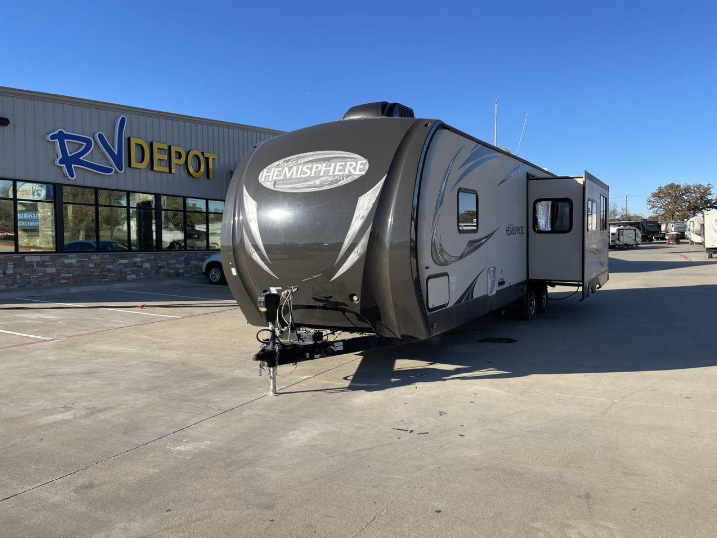 2014 TAN FOREST RIVER HEMISPHERE 282RK (4X4TSBD2XEU) , Length: 35 ft. | Dry Weight: 6,620 lbs | Gross Weight: 8,521 lbs. | Slides: 1 transmission, located at 4319 N Main St, Cleburne, TX, 76033, (817) 678-5133, 32.385960, -97.391212 - The 2014 Forest River Hemisphere 282RK is a great travel trailer that is made to make your outdoor activities more comfortable and easy. This 35-foot trailer has a dry weight of 6,620 pounds and a gross weight of 8,521 pounds, making it easy to tow and providing plenty of space for all your gear. Th - Photo#0