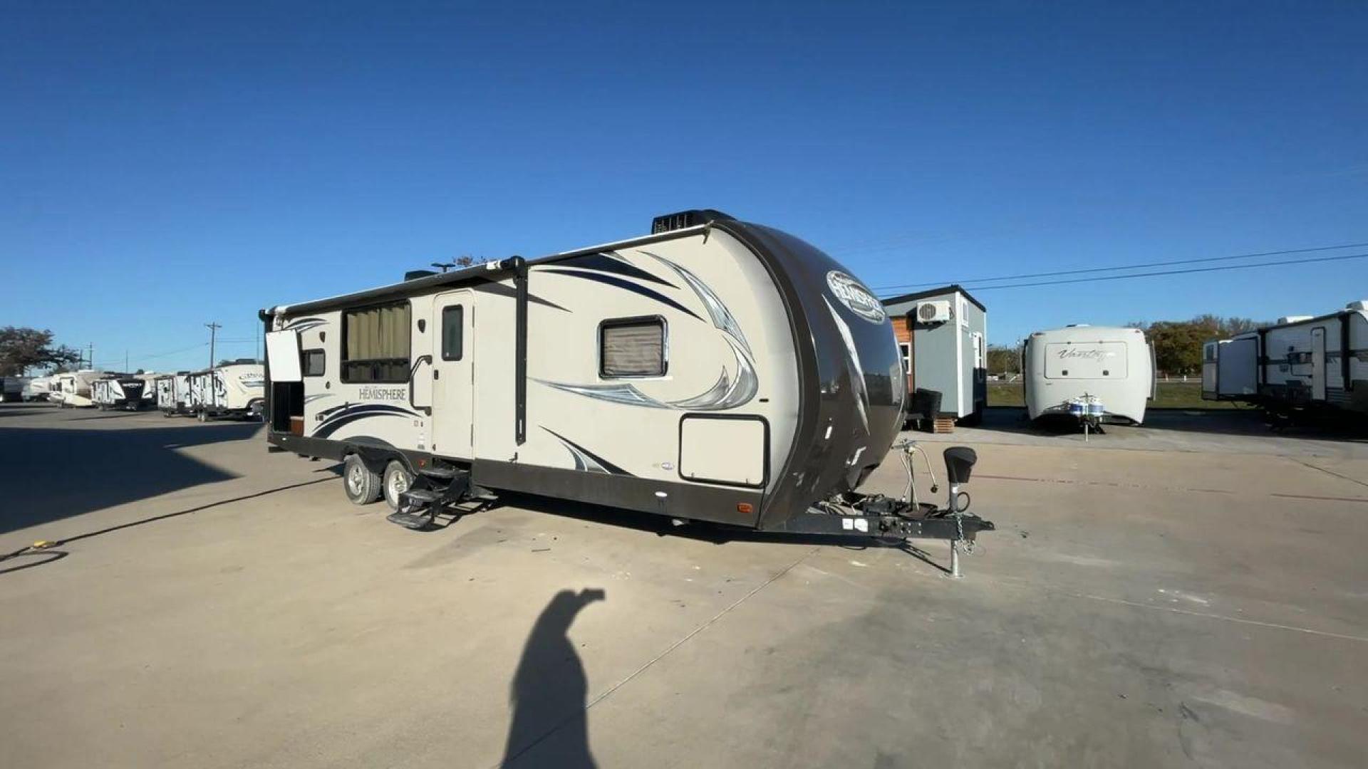 2014 TAN FOREST RIVER HEMISPHERE 282RK (4X4TSBD2XEU) , Length: 35 ft. | Dry Weight: 6,620 lbs | Gross Weight: 8,521 lbs. | Slides: 1 transmission, located at 4319 N Main St, Cleburne, TX, 76033, (817) 678-5133, 32.385960, -97.391212 - The 2014 Forest River Hemisphere 282RK is a great travel trailer that is made to make your outdoor activities more comfortable and easy. This 35-foot trailer has a dry weight of 6,620 pounds and a gross weight of 8,521 pounds, making it easy to tow and providing plenty of space for all your gear. Th - Photo#3