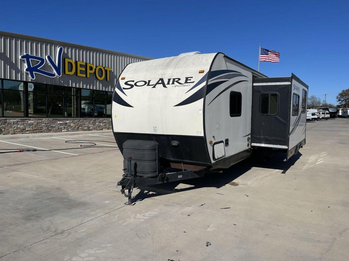 2014 BEIGE FOREST RIVER SOLAIRE 25BHSS - (4X4TPAA25EN) , located at 4319 N Main St, Cleburne, TX, 76033, (817) 678-5133, 32.385960, -97.391212 - Here are additional factors highlighting why owning this RV is a superb choice. (1) Clocking in around 4,690 lbs, the Solaire 25BHSS is Lightweight Adventure-Ready (2) Relax under the shade and enjoy alfresco dining with the convenient awning that sets up in a flash. (3) Ditch the portable gr - Photo#0