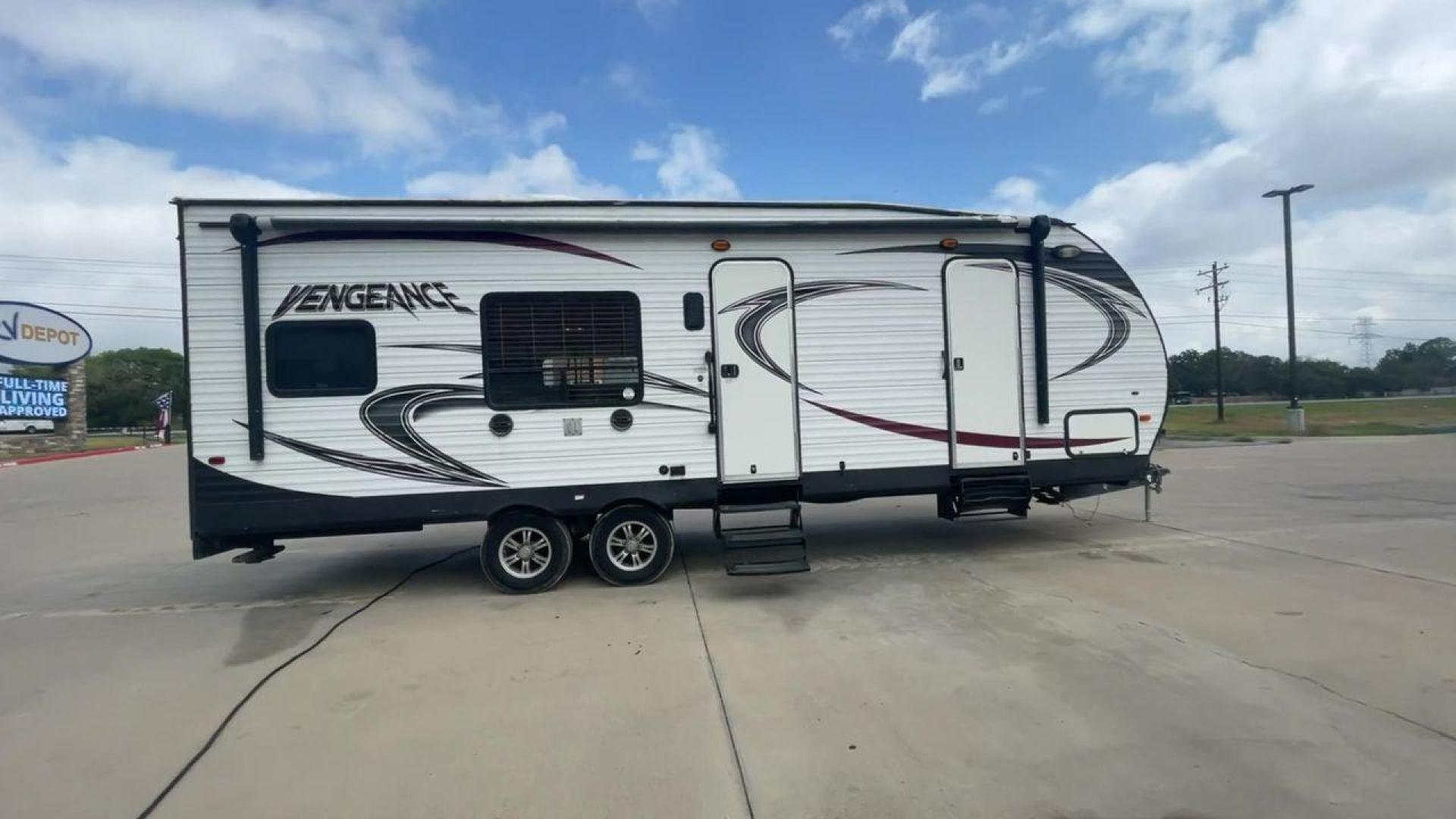 2014 WHITE FOREST RIVER VENGEANCE 25V - (4X4TVGA25EX) , Length: 30.5 ft. | Dry Weight: 6,366 lbs. | Gross Weight: 9,985 lbs. | Slides: 0 transmission, located at 4319 N Main St, Cleburne, TX, 76033, (817) 678-5133, 32.385960, -97.391212 - The 2014 Forest River Vengeance 25V is a tough and roomy travel trailer made for people who love the outdoors and want to be comfortable and easy on their trips. This trailer provides generous living space and is conveniently lightweight, making it a breeze to tow. With its compact size, the Vengean - Photo#2