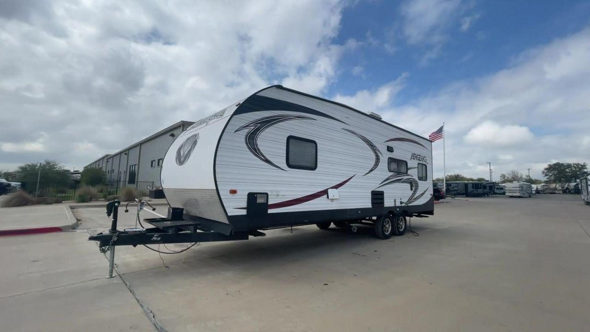 2014 WHITE FOREST RIVER VENGEANCE 25V - (4X4TVGA25EX) , Length: 30.5 ft. | Dry Weight: 6,366 lbs. | Gross Weight: 9,985 lbs. | Slides: 0 transmission, located at 4319 N Main St, Cleburne, TX, 76033, (817) 678-5133, 32.385960, -97.391212 - The 2014 Forest River Vengeance 25V is a tough and roomy travel trailer made for people who love the outdoors and want to be comfortable and easy on their trips. This trailer provides generous living space and is conveniently lightweight, making it a breeze to tow. With its compact size, the Vengean - Photo#5