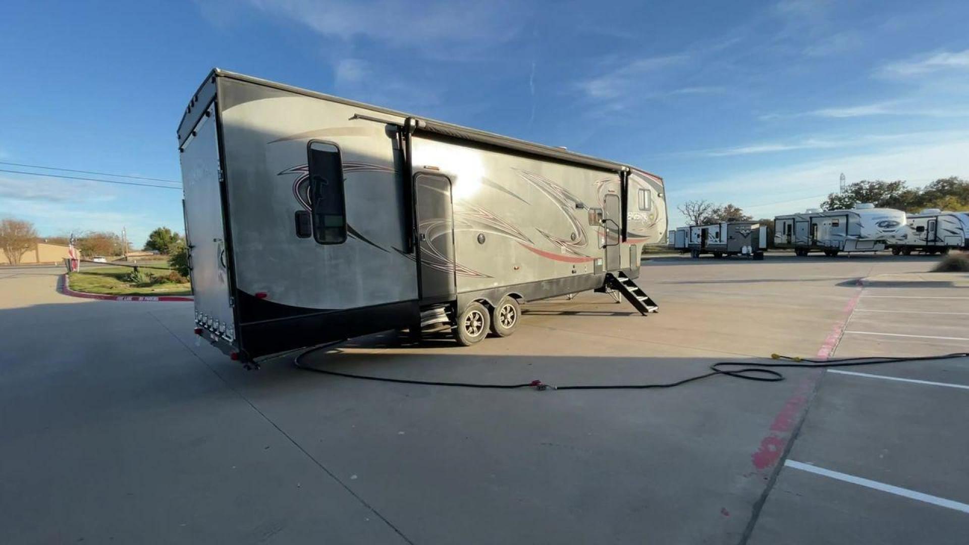 2014 WHITE FOREST RIVER VENGEANCE 312A (4X4FVGG22EY) , Length: 37.92 ft. | Dry Weight: 10,068 lbs. | Gross Weight: 14,508 lbs. | Slides: 1 transmission, located at 4319 N Main St, Cleburne, TX, 76033, (817) 678-5133, 32.385960, -97.391212 - This 2014 Vengeance Toy Hauler has a dry weight of 10,068 lbs and a GVWR of 14,508 lbs with a hitch weight of 2,508 lbs. This unit also has automatic heating and cooling for optimal temperature control. The exterior of this toy hauler is a simple cream base with black and red accents. This model als - Photo#1