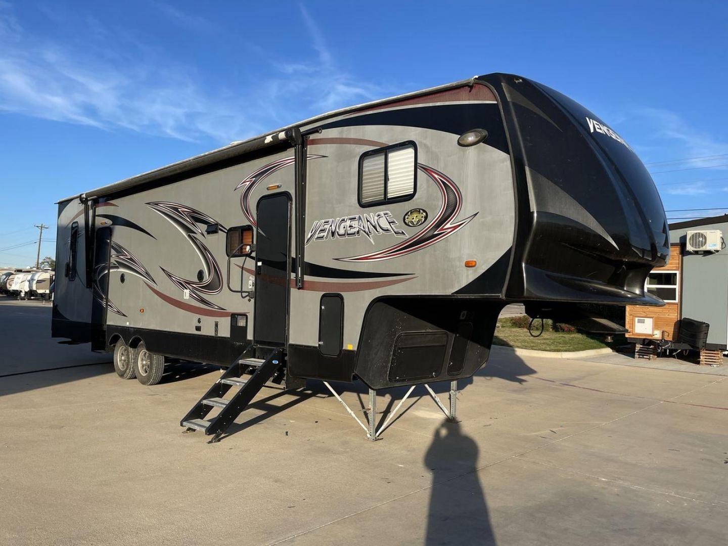 2014 WHITE FOREST RIVER VENGEANCE 312A (4X4FVGG22EY) , Length: 37.92 ft. | Dry Weight: 10,068 lbs. | Gross Weight: 14,508 lbs. | Slides: 1 transmission, located at 4319 N Main St, Cleburne, TX, 76033, (817) 678-5133, 32.385960, -97.391212 - This 2014 Vengeance Toy Hauler has a dry weight of 10,068 lbs and a GVWR of 14,508 lbs with a hitch weight of 2,508 lbs. This unit also has automatic heating and cooling for optimal temperature control. The exterior of this toy hauler is a simple cream base with black and red accents. This model als - Photo#23