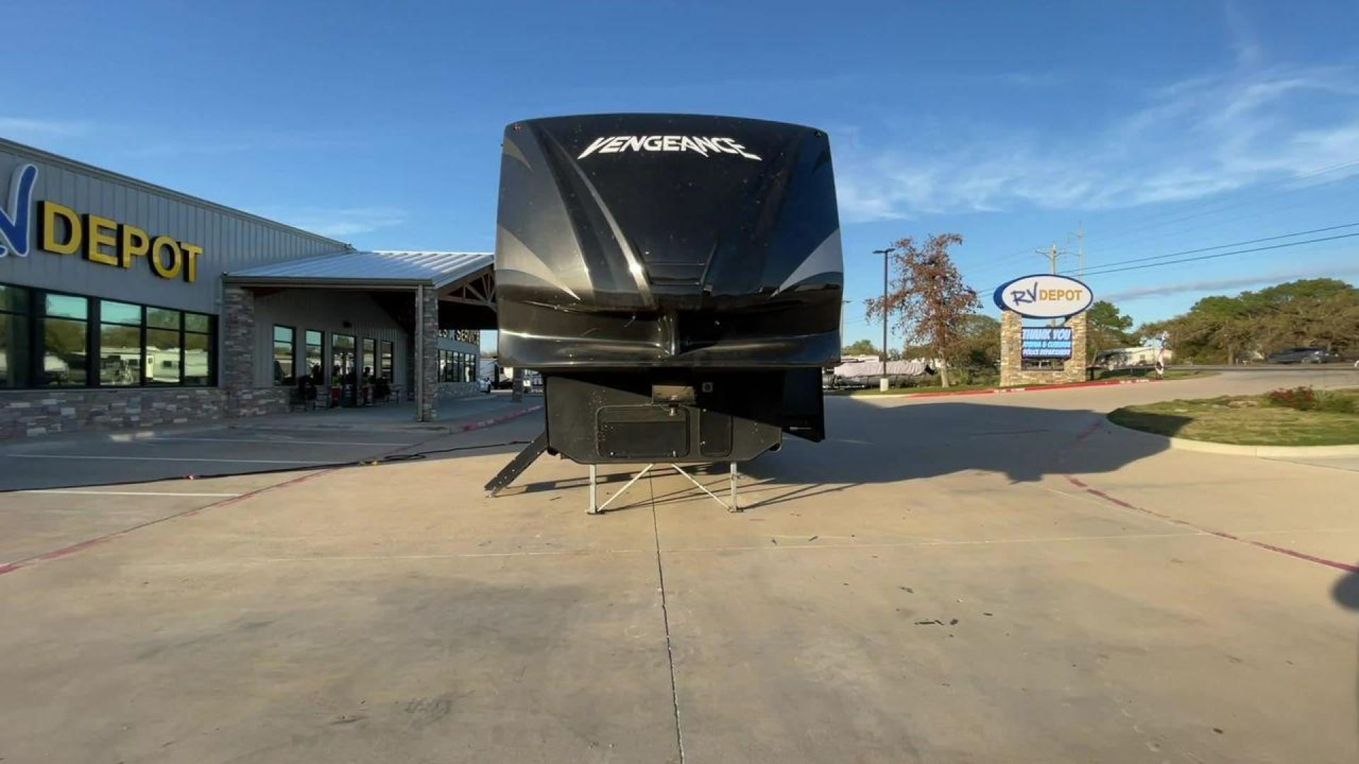 2014 WHITE FOREST RIVER VENGEANCE 312A (4X4FVGG22EY) , Length: 37.92 ft. | Dry Weight: 10,068 lbs. | Gross Weight: 14,508 lbs. | Slides: 1 transmission, located at 4319 N Main St, Cleburne, TX, 76033, (817) 678-5133, 32.385960, -97.391212 - This 2014 Vengeance Toy Hauler has a dry weight of 10,068 lbs and a GVWR of 14,508 lbs with a hitch weight of 2,508 lbs. This unit also has automatic heating and cooling for optimal temperature control. The exterior of this toy hauler is a simple cream base with black and red accents. This model als - Photo#4