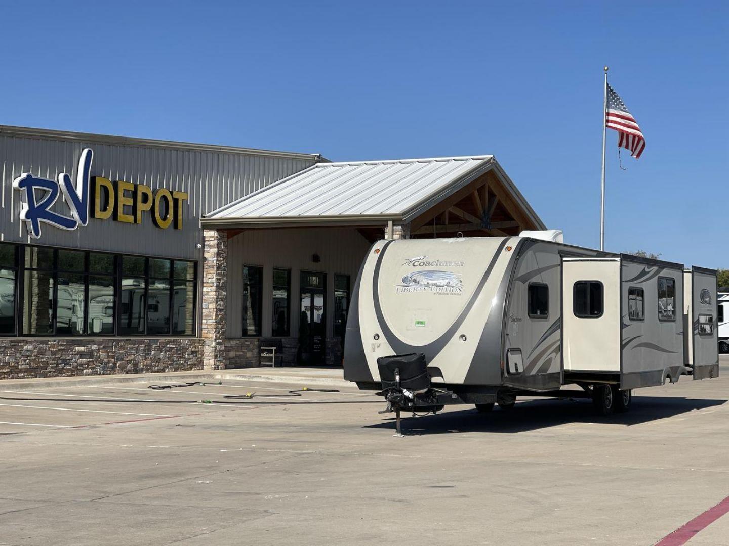 2014 TAN FREEDOM EXPRESS 310BHDS - (5ZT2FEWB0EA) , Length: 35.58 ft | Dry Weight: 6,597 lbs | Slides: 2 transmission, located at 4319 N Main St, Cleburne, TX, 76033, (817) 678-5133, 32.385960, -97.391212 - The 2014 Freedom Express 310BHDS Travel Trailer is ready to take you on a trip through the great outdoors in style. This large and flexible trailer is great for your next adventure because it has plenty of room for the whole family and is comfortable and easy to use. The Freedom Express is 35.58 fee - Photo#0