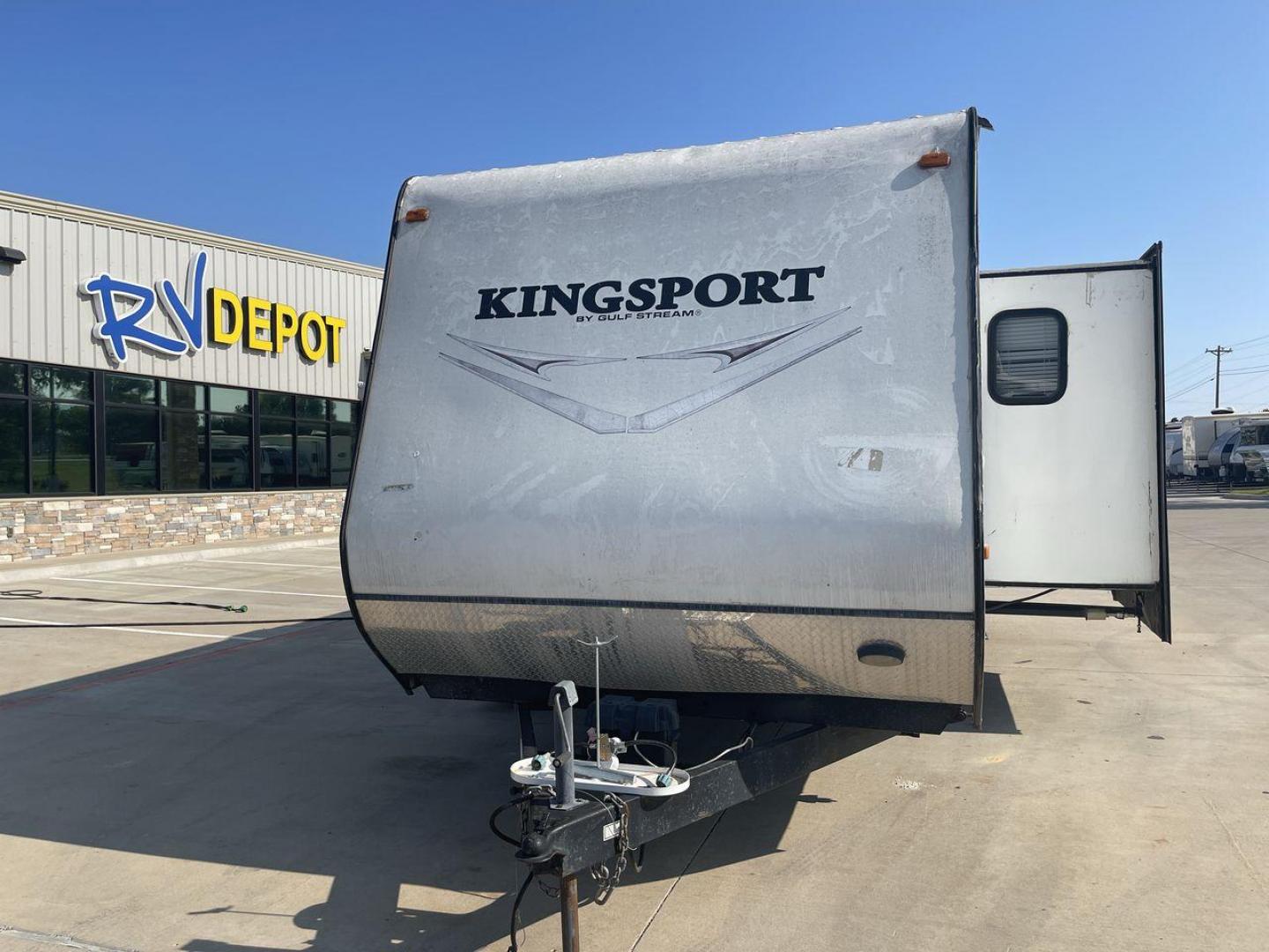 2014 WHITE GULFSTREAM KINGSPORT 265BHG (1NL1GTM28E1) , Length: 28.92 ft. | Dry Weight: 6,000 lbs. | Slides: 1 transmission, located at 4319 N Main St, Cleburne, TX, 76033, (817) 678-5133, 32.385960, -97.391212 - With the 2014 Gulf Stream Kingsport 265BHG Travel Trailer, go out on your camping excursions. This travel trailer, built for ease and comfort, provides a flexible and luxurious living area for wonderful outdoor adventures. This unit has dimensions of 28.92 ft in length, 8 ft in width, and 10.75 f - Photo#0