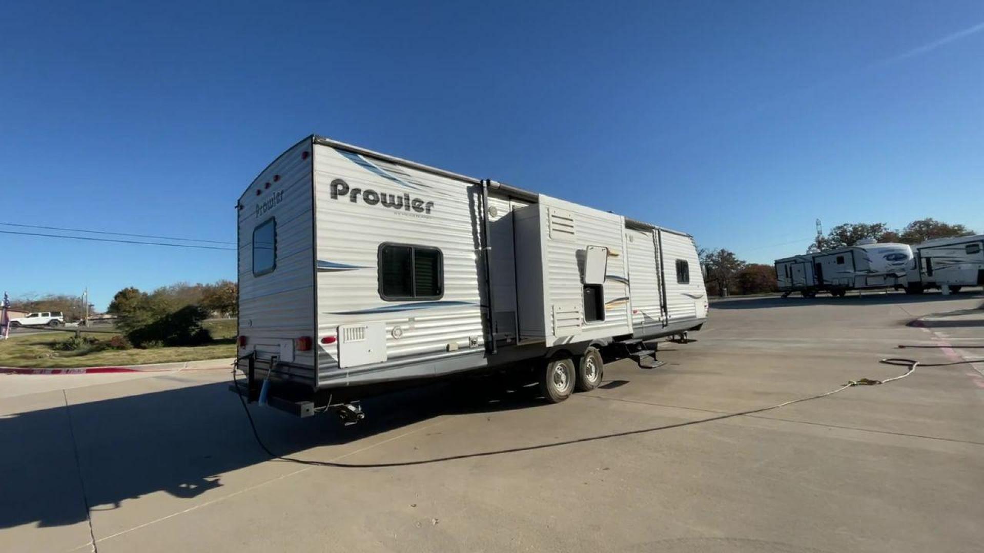 2014 HEARTLAND PROWLER 33PBHS (5SFPB3622EE) , located at 4319 N Main St, Cleburne, TX, 76033, (817) 678-5133, 32.385960, -97.391212 - Photo#1