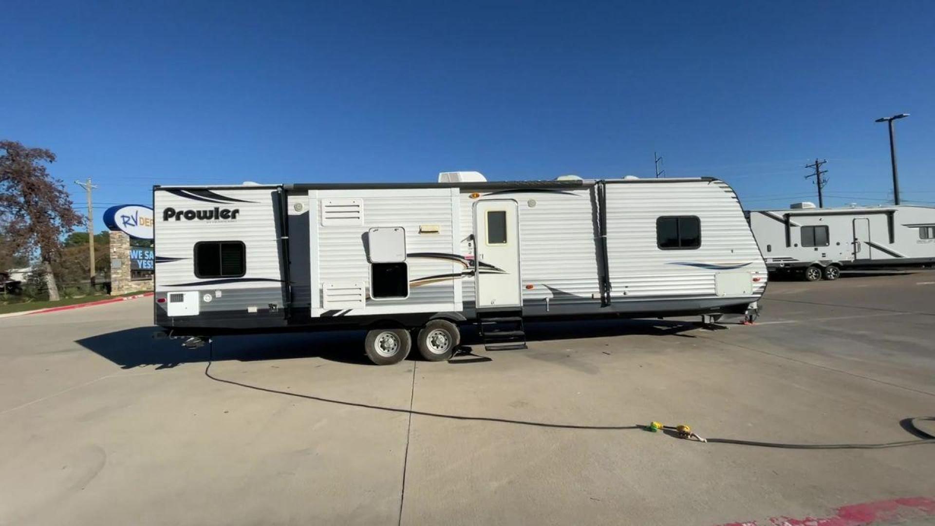 2014 HEARTLAND PROWLER 33PBHS (5SFPB3622EE) , located at 4319 N Main St, Cleburne, TX, 76033, (817) 678-5133, 32.385960, -97.391212 - Photo#2