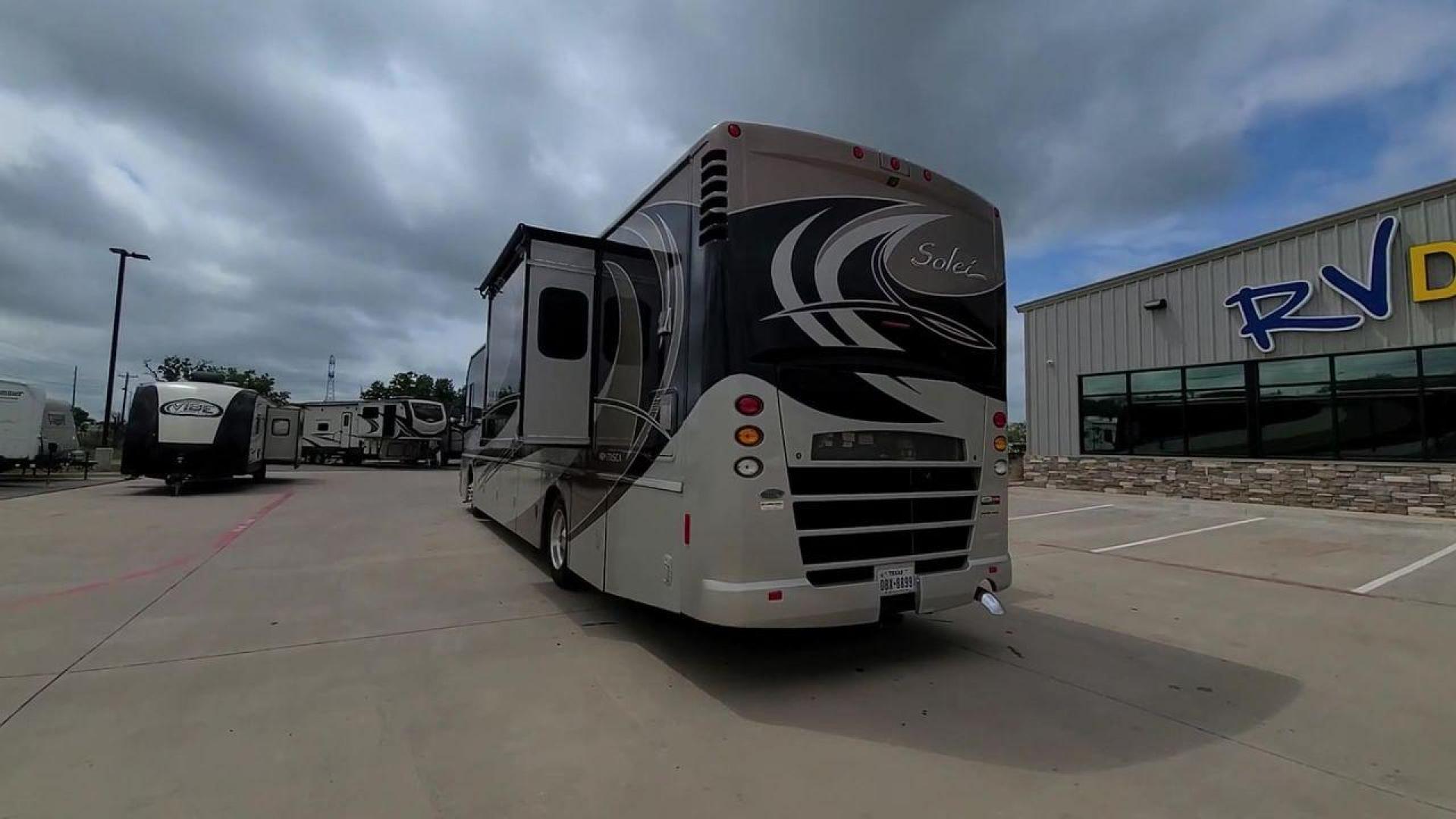 2014 ITASCA SOLEI 38R (4UZACJDT2EC) , Length: 39.8 ft. | Gross Weight: 27,910 lbs. | Slides: 2 transmission, located at 4319 N Main St, Cleburne, TX, 76033, (817) 678-5133, 32.385960, -97.391212 - The 2014 Itasca Solei 38R Motor Home is a sophisticated and spacious Class A RV designed for the ultimate road-tripping experience. Powered by a potent 300-horsepower Cummins diesel engine and built on a Freightliner XCS chassis, this motorhome ensures a smooth and powerful ride. Measuring 39 feet i - Photo#1