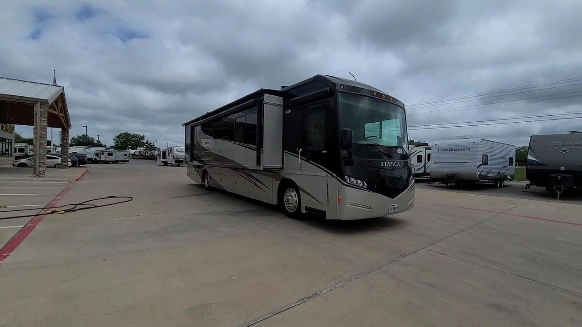 2014 ITASCA SOLEI 38R (4UZACJDT2EC) , Length: 39.8 ft. | Gross Weight: 27,910 lbs. | Slides: 2 transmission, located at 4319 N Main St, Cleburne, TX, 76033, (817) 678-5133, 32.385960, -97.391212 - The 2014 Itasca Solei 38R Motor Home is a sophisticated and spacious Class A RV designed for the ultimate road-tripping experience. Powered by a potent 300-horsepower Cummins diesel engine and built on a Freightliner XCS chassis, this motorhome ensures a smooth and powerful ride. Measuring 39 feet i - Photo#5