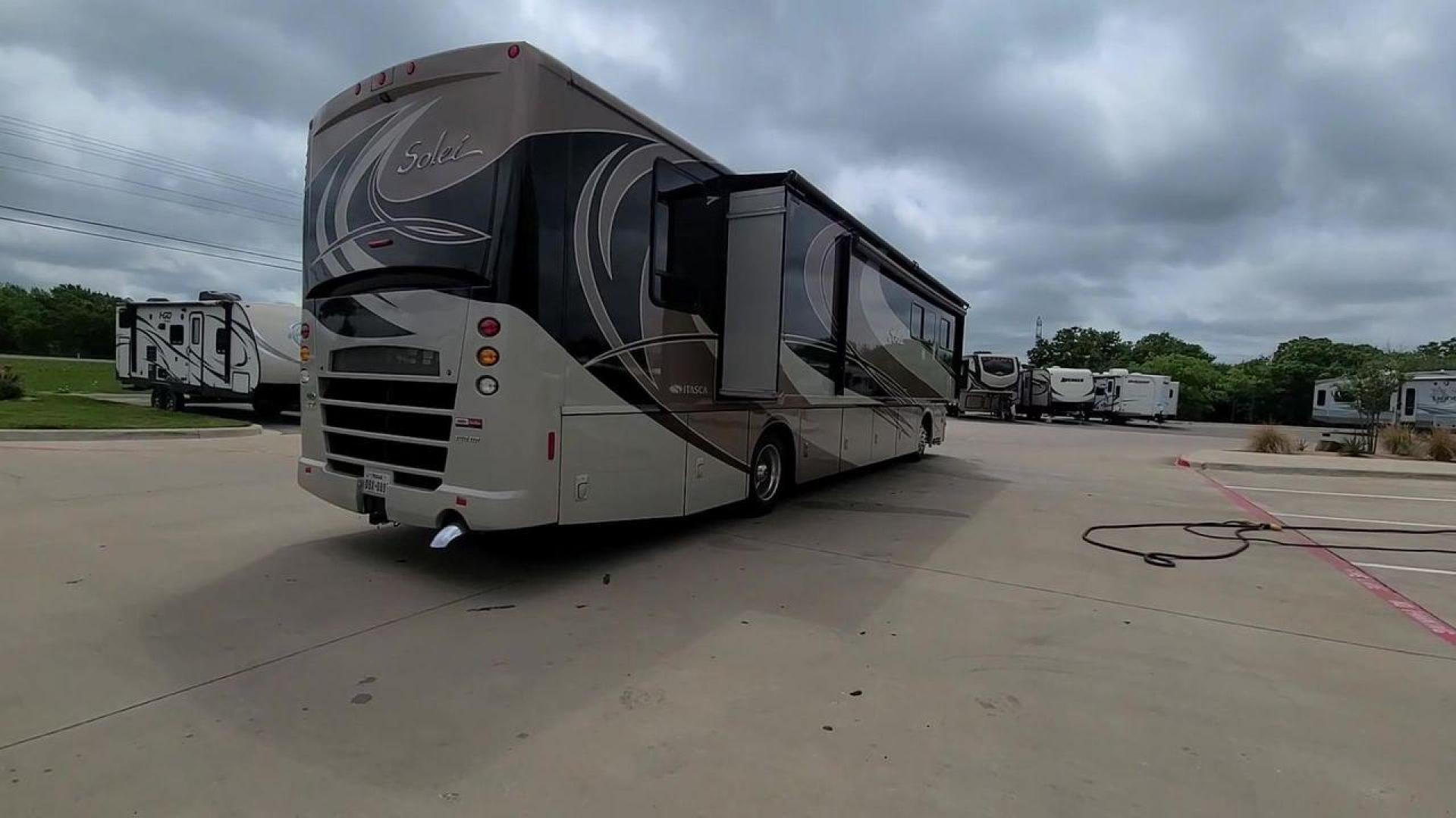 2014 ITASCA SOLEI 38R (4UZACJDT2EC) , Length: 39.8 ft. | Gross Weight: 27,910 lbs. | Slides: 2 transmission, located at 4319 N Main St, Cleburne, TX, 76033, (817) 678-5133, 32.385960, -97.391212 - The 2014 Itasca Solei 38R Motor Home is a sophisticated and spacious Class A RV designed for the ultimate road-tripping experience. Powered by a potent 300-horsepower Cummins diesel engine and built on a Freightliner XCS chassis, this motorhome ensures a smooth and powerful ride. Measuring 39 feet i - Photo#8