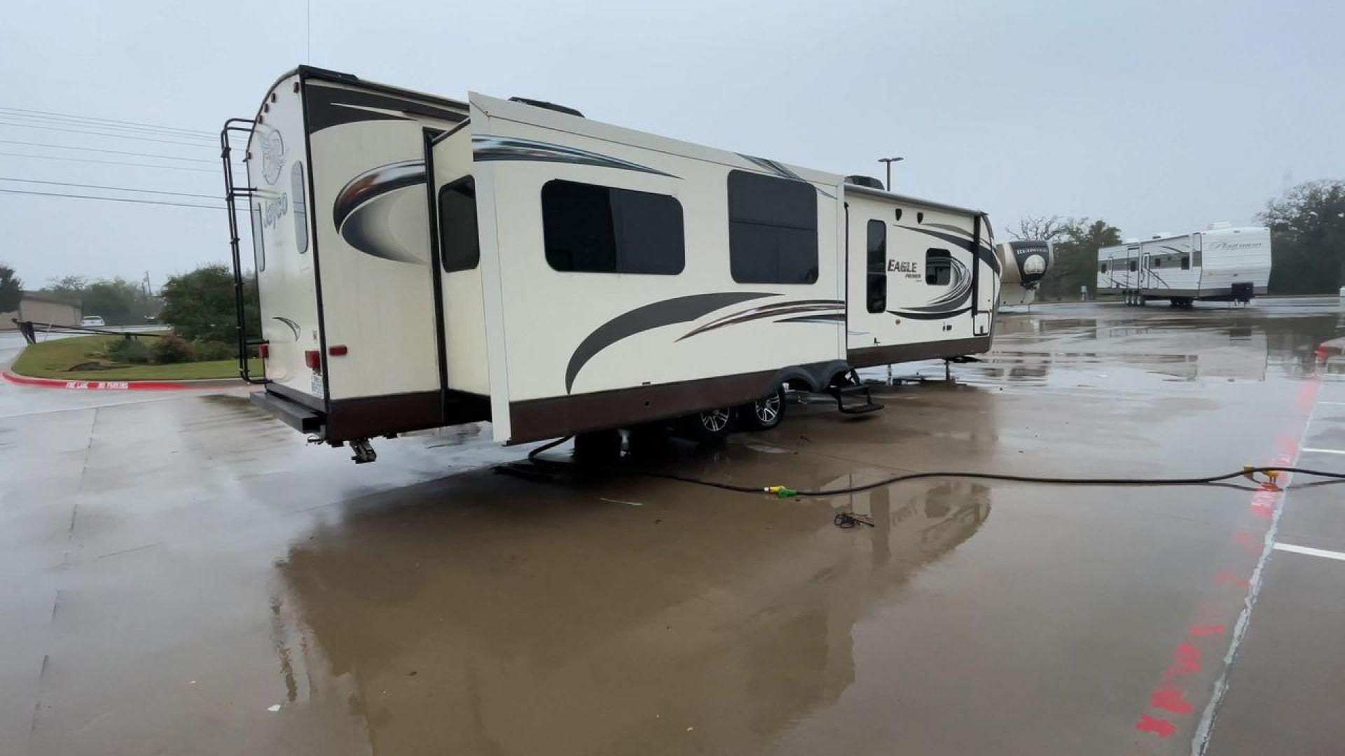 2014 BEIGE JAYCO EAGLEPREMIER 338RETS (1UJBJ0BU9E1) , Length: 39 ft. | Dry Weight: 8,590 lbs. | Gross Weight: 10,950 lbs. | Slides: 3 transmission, located at 4319 N Main St, Cleburne, TX, 76033, (817) 678-5133, 32.385960, -97.391212 - Photo#1