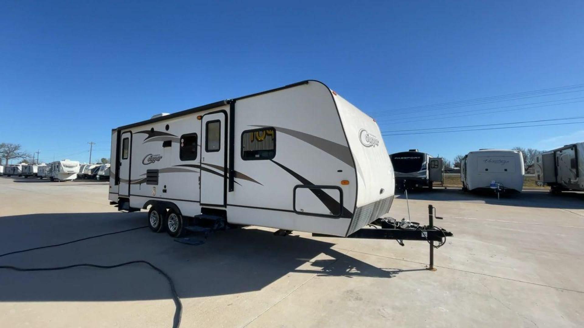 2014 WHITE KEYSTONE COUGAR MDL 260RB (4YDT26027EV) , Length: 29.67 ft. | Dry Weight: 5,065 lbs. | Slides: 1 transmission, located at 4319 N Main St, Cleburne, TX, 76033, (817) 678-5133, 32.385960, -97.391212 - The 2014 Keystone Cougar Model 260RB travel trailer offers the ideal fusion of elegance and utility. With its roomy and welcoming interior, this well-designed RV is a great option for both long trips and weekend excursions. This travel trailer has a length of 29.8 ft and weighs 5,065 lbs. It is s - Photo#3