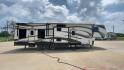 2014 WHITE KEYSTONE FUZION M-399 (4YDF39939EF) , Length: 41 ft. | Dry Weight: 14,100 lbs. | Gross Weight: 18,000 lbs. | Slides: 3 transmission, located at 4319 N Main St, Cleburne, TX, 76033, (817) 678-5133, 32.385960, -97.391212 - The 2014 Keystone Fuzion M-399 offers exceptional value for its price. With its white exterior color, this RV stands out on the road and is sure to turn heads wherever you go. Measuring 41 ft. in length, this toy hauler provides ample space for you and your loved ones to relax and enjoy your travels - Photo#2