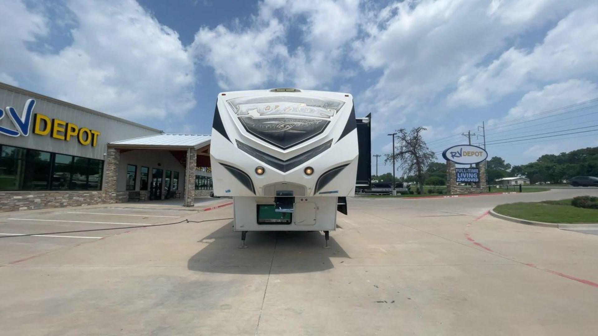 2014 WHITE KEYSTONE FUZION M-399 (4YDF39939EF) , Length: 41 ft. | Dry Weight: 14,100 lbs. | Gross Weight: 18,000 lbs. | Slides: 3 transmission, located at 4319 N Main St, Cleburne, TX, 76033, (817) 678-5133, 32.385960, -97.391212 - The 2014 Keystone Fuzion M-399 offers exceptional value for its price. With its white exterior color, this RV stands out on the road and is sure to turn heads wherever you go. Measuring 41 ft. in length, this toy hauler provides ample space for you and your loved ones to relax and enjoy your travels - Photo#4