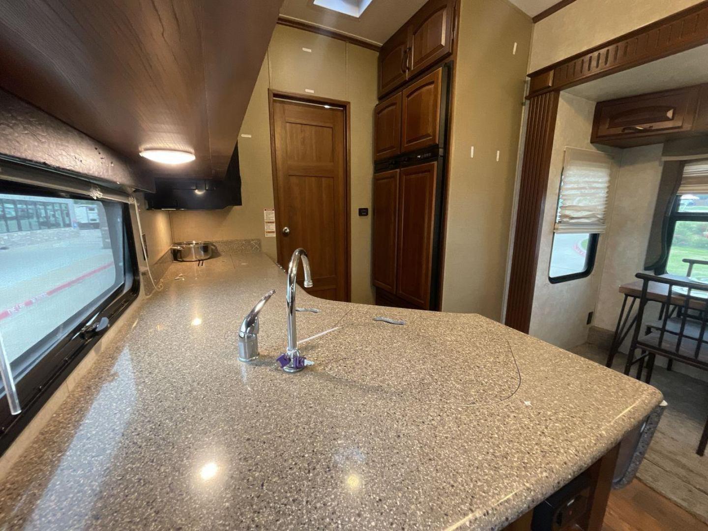 2014 WHITE KEYSTONE MONTANA 3750FL (4YDF37522E4) , located at 4319 N Main St, Cleburne, TX, 76033, (817) 678-5133, 32.385960, -97.391212 - This 2014 Montana 3750FL fifth wheel measures just over 38' in length. It is a dual axle, aluminum wheel setup with a dry weight of 12,597 lbs and has a carrying capacity of 3,173 lbs. This fifth wheel has five slides. The rear of the fifth wheel holds the bedroom. It has a queen sized bed with a - Photo#27