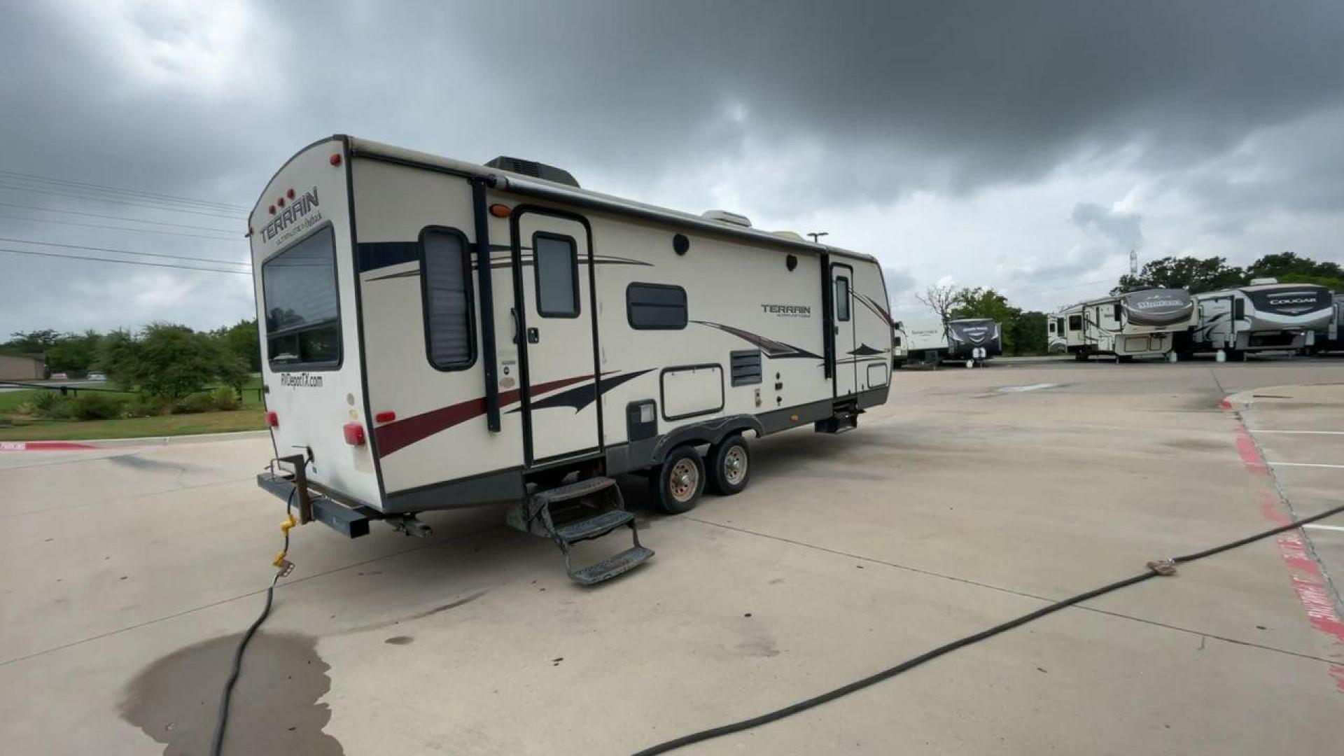 2014 TAN KEYSTONE OUTBACK TERRAIN 273T (4YDT27323EB) , Length: 30 ft. | Dry Weight: 5,758 lbs. | Gross Weight: 7,800 lbs. | Slides: 1 transmission, located at 4319 N Main St, Cleburne, TX, 76033, (817) 678-5133, 32.385960, -97.391212 - With the 2014 Keystone Outback Terrain 273TRL travel trailer, set out on your next adventure. This well-thought-out RV offers the ideal balance of flair and utility, making it a home away from home for your journeys. The dimensions of this unit are 30 ft in length, 8 ft in width, and 10.92 ft in - Photo#1