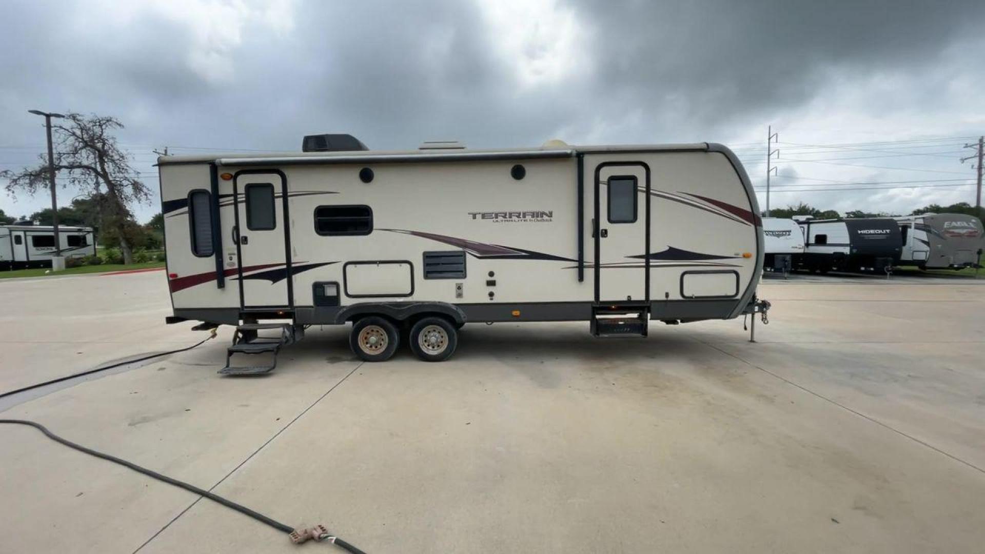 2014 TAN KEYSTONE OUTBACK TERRAIN 273T (4YDT27323EB) , Length: 30 ft. | Dry Weight: 5,758 lbs. | Gross Weight: 7,800 lbs. | Slides: 1 transmission, located at 4319 N Main St, Cleburne, TX, 76033, (817) 678-5133, 32.385960, -97.391212 - With the 2014 Keystone Outback Terrain 273TRL travel trailer, set out on your next adventure. This well-thought-out RV offers the ideal balance of flair and utility, making it a home away from home for your journeys. The dimensions of this unit are 30 ft in length, 8 ft in width, and 10.92 ft in - Photo#2