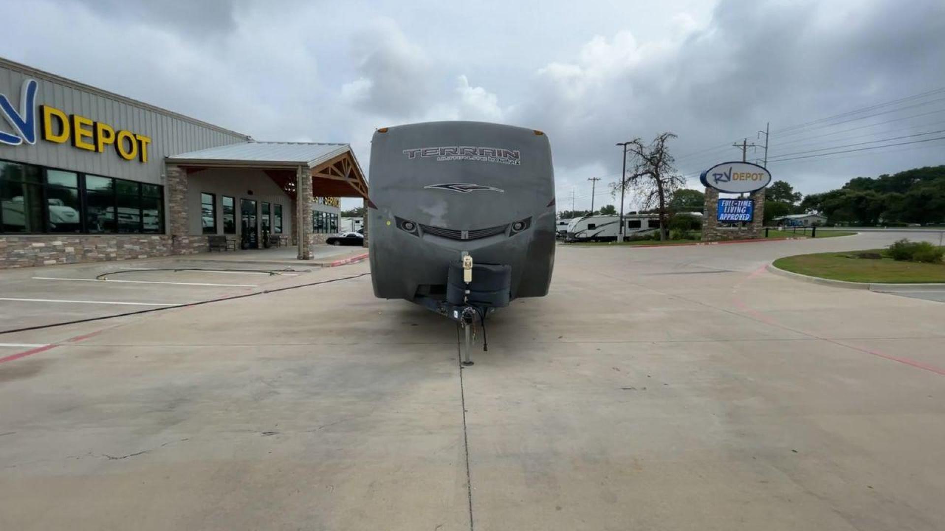 2014 TAN KEYSTONE OUTBACK TERRAIN 273T (4YDT27323EB) , Length: 30 ft. | Dry Weight: 5,758 lbs. | Gross Weight: 7,800 lbs. | Slides: 1 transmission, located at 4319 N Main St, Cleburne, TX, 76033, (817) 678-5133, 32.385960, -97.391212 - With the 2014 Keystone Outback Terrain 273TRL travel trailer, set out on your next adventure. This well-thought-out RV offers the ideal balance of flair and utility, making it a home away from home for your journeys. The dimensions of this unit are 30 ft in length, 8 ft in width, and 10.92 ft in - Photo#4