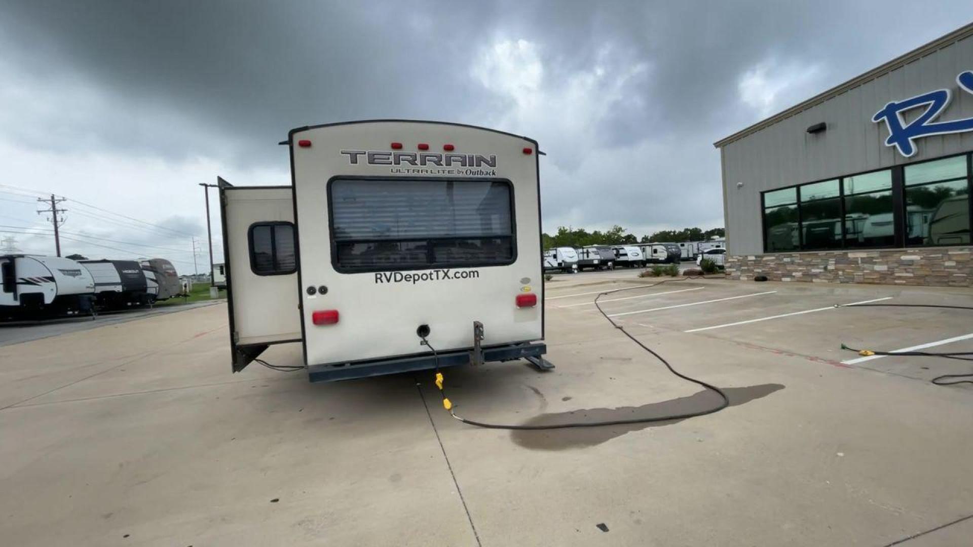 2014 TAN KEYSTONE OUTBACK TERRAIN 273T (4YDT27323EB) , Length: 30 ft. | Dry Weight: 5,758 lbs. | Gross Weight: 7,800 lbs. | Slides: 1 transmission, located at 4319 N Main St, Cleburne, TX, 76033, (817) 678-5133, 32.385960, -97.391212 - With the 2014 Keystone Outback Terrain 273TRL travel trailer, set out on your next adventure. This well-thought-out RV offers the ideal balance of flair and utility, making it a home away from home for your journeys. The dimensions of this unit are 30 ft in length, 8 ft in width, and 10.92 ft in - Photo#8