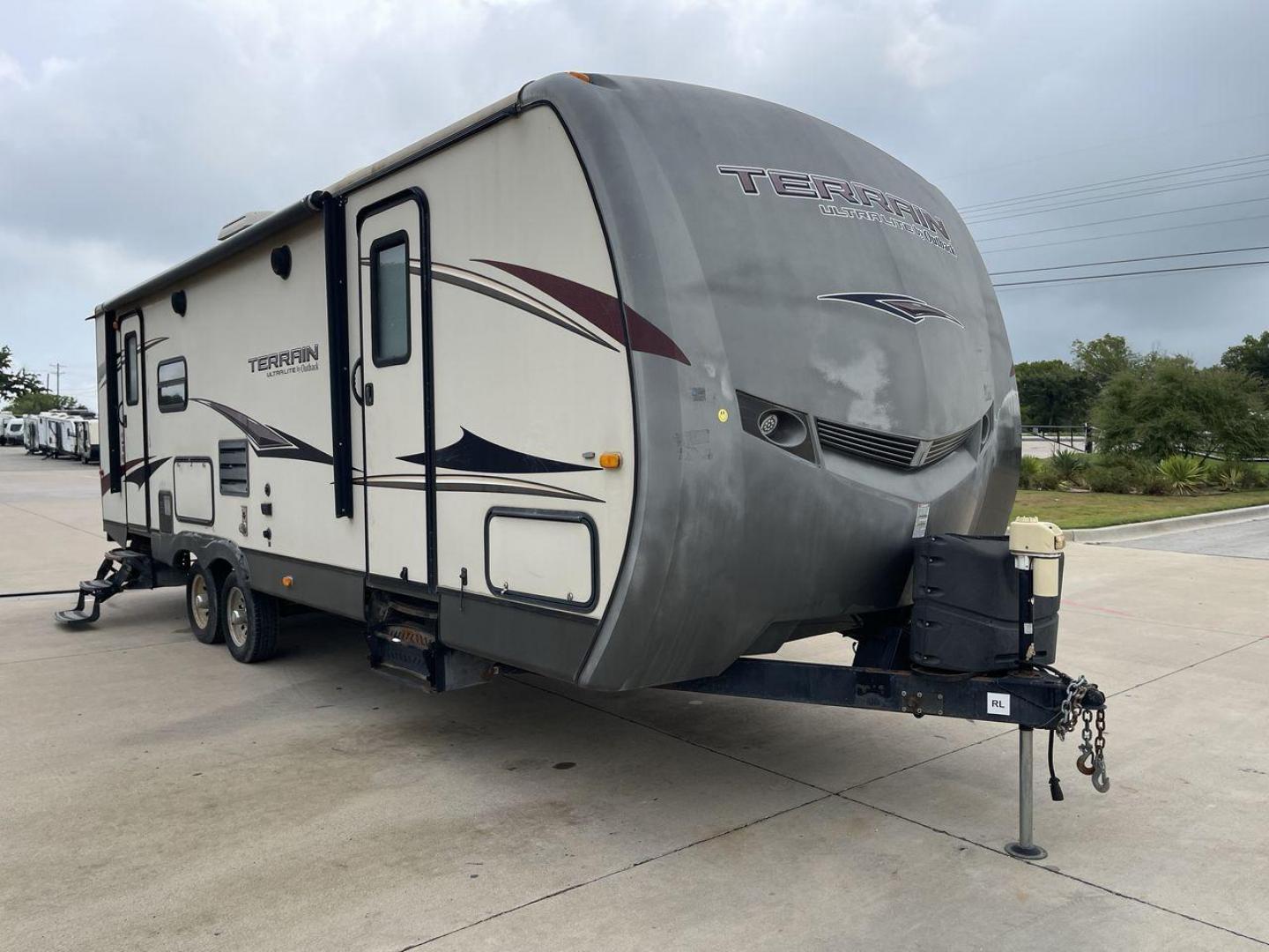 2014 TAN KEYSTONE OUTBACK TERRAIN 273T (4YDT27323EB) , Length: 30 ft. | Dry Weight: 5,758 lbs. | Gross Weight: 7,800 lbs. | Slides: 1 transmission, located at 4319 N Main St, Cleburne, TX, 76033, (817) 678-5133, 32.385960, -97.391212 - With the 2014 Keystone Outback Terrain 273TRL travel trailer, set out on your next adventure. This well-thought-out RV offers the ideal balance of flair and utility, making it a home away from home for your journeys. The dimensions of this unit are 30 ft in length, 8 ft in width, and 10.92 ft in - Photo#23