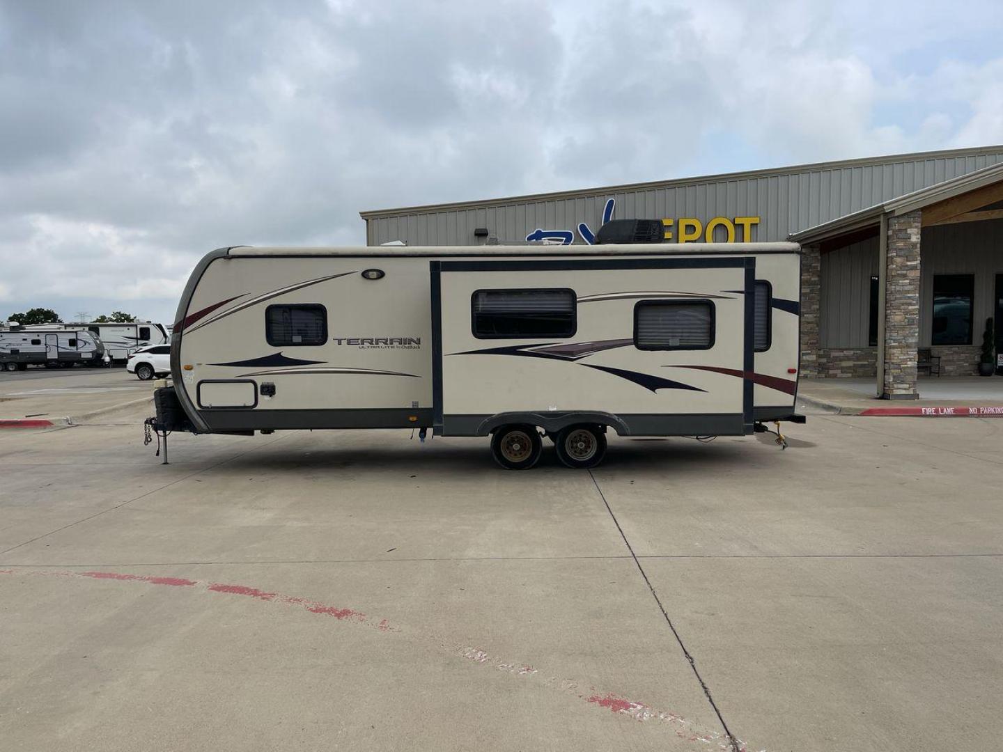 2014 TAN KEYSTONE OUTBACK TERRAIN 273T (4YDT27323EB) , Length: 30 ft. | Dry Weight: 5,758 lbs. | Gross Weight: 7,800 lbs. | Slides: 1 transmission, located at 4319 N Main St, Cleburne, TX, 76033, (817) 678-5133, 32.385960, -97.391212 - With the 2014 Keystone Outback Terrain 273TRL travel trailer, set out on your next adventure. This well-thought-out RV offers the ideal balance of flair and utility, making it a home away from home for your journeys. The dimensions of this unit are 30 ft in length, 8 ft in width, and 10.92 ft in - Photo#24