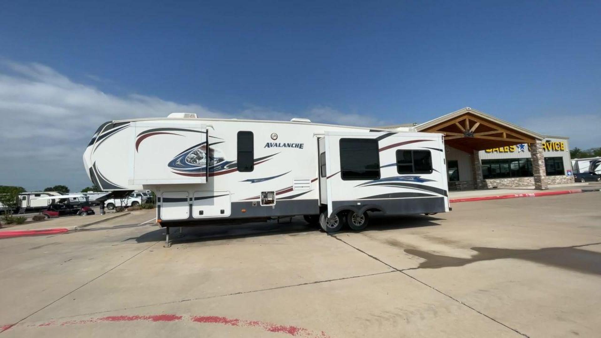 2014 KEYSTONE RV AVALANCHE 345TG (4YDF34521EE) , Length: 37.92 ft. | Dry Weight: 11,417 lbs. | Gross Weight: 14,140 lbs. | Slides: 3 transmission, located at 4319 N Main St, Cleburne, TX, 76033, (817) 678-5133, 32.385960, -97.391212 - Set out on an adventure filled with luxury and comfort in the 2014 Keystone Avalanche 345TG, a fifth wheel crafted to elevate your RV experience. With its 37.92-foot size, this model seamlessly blends sophisticated design with functional features, making it an ideal sanctuary for your travels. Built - Photo#6