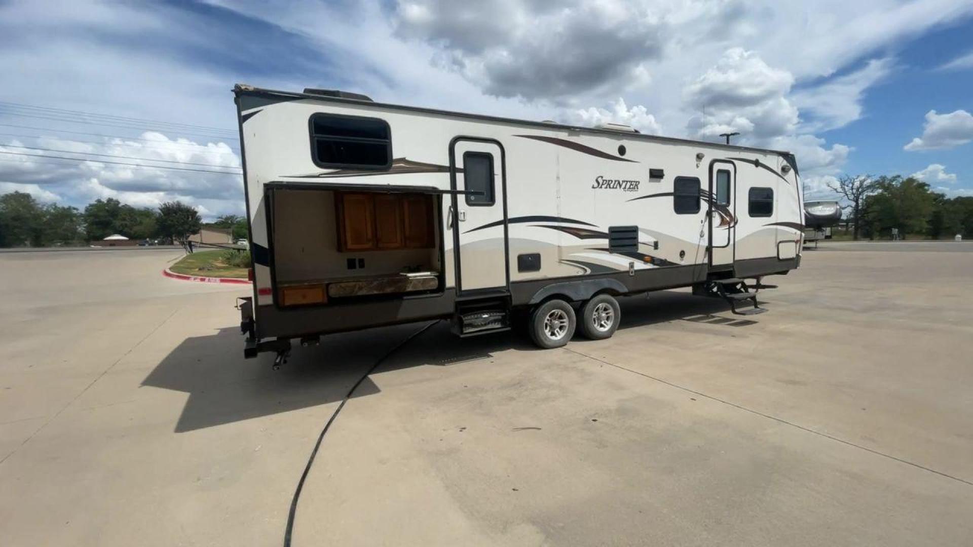 2014 WHITE KEYSTONE SPRINTER 311BHS - (4YDT31122E1) , Length: 35.33 ft. | Dry Weight: 8,260 lbs. | Gross Weight: 10,995 lbs. | Slides: 2 transmission, located at 4319 N Main St, Cleburne, TX, 76033, (817) 678-5133, 32.385960, -97.391212 - This 2014 Keystone Sprinter 311BHS is a dual-axle steel wheel setup that measures 35.33 ft. long. It has a dry weight of 8,260 lbs. and a GVWR of 10,995 lbs. It includes 2 power slides as well as 1 power awning. This travel trailer offers sleeping space for up to 10 people with its front queen bed - Photo#1