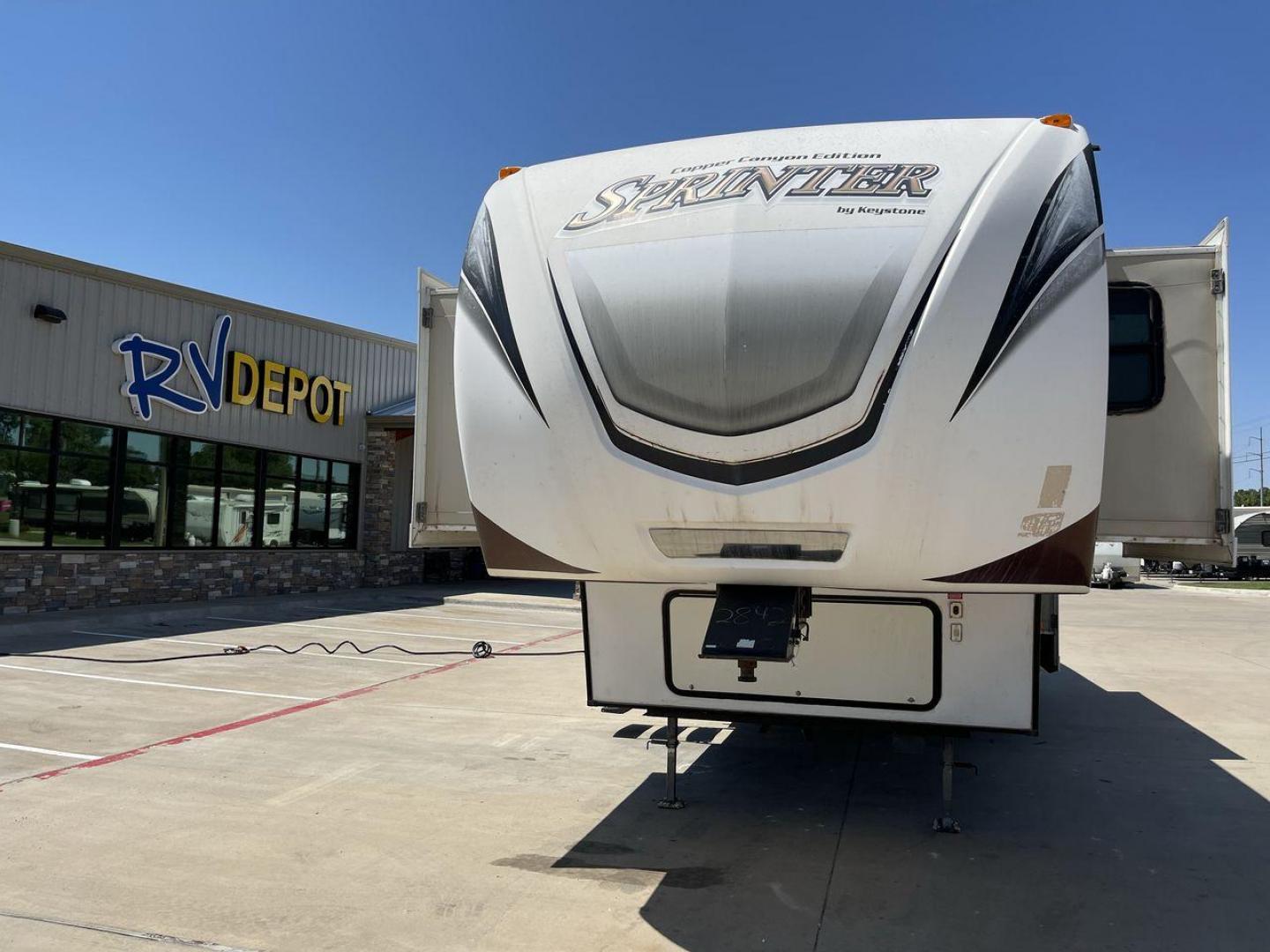 2014 WHITE KEYSTONE SPRINTER 359FWMPR - (4YDF33321E1) , Length: 37.33 ft. | Dry Weight: 9,598 lbs. | Gross Weight: 12,750 lbs. | Slides: 3 transmission, located at 4319 N Main St, Cleburne, TX, 76033, (817) 678-5133, 32.385960, -97.391212 - The 2014 Sprinter 333FWLS by Keystone luxury fifth wheel brings the spotlight to its elevated front living area floorplan with a rear private bedroom and a spacious center kitchen. It measures just 37.33 ft in length, 8 ft in width, and 12.5 ft in height. It has a base weight of 9,598 lbs with a pay - Photo#0