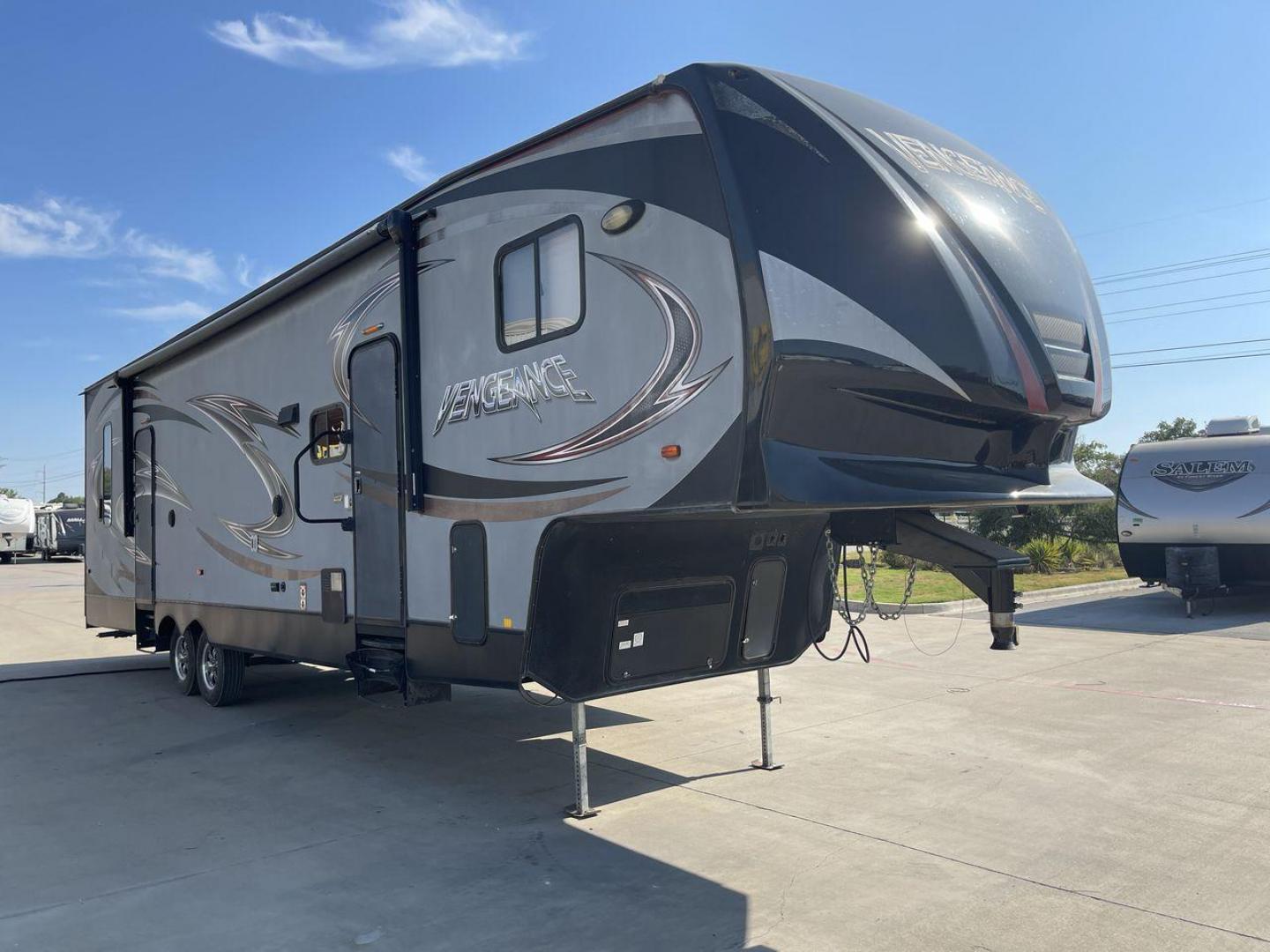 2014 KEYSTONE VENGEANCE 312A (4X4FVGG28EY) , Length: 37.92 ft. | Dry Weight: 10,068 lbs. | Gross Weight: 14,508 lbs. | Slides: 1 transmission, located at 4319 N Main St, Cleburne, TX, 76033, (817) 678-5133, 32.385960, -97.391212 - This 2014 Keystone Vengeance 312A measures 37.92 ft. in length and has a dry weight of 10,068 lbs. It also has a GVWR of 14,508 lbs. and a hitch weight of 2,508 lbs. This unit has automatic heating and cooling for optimal temperature control. It is made of aluminum and fiberglass. This model also co - Photo#23