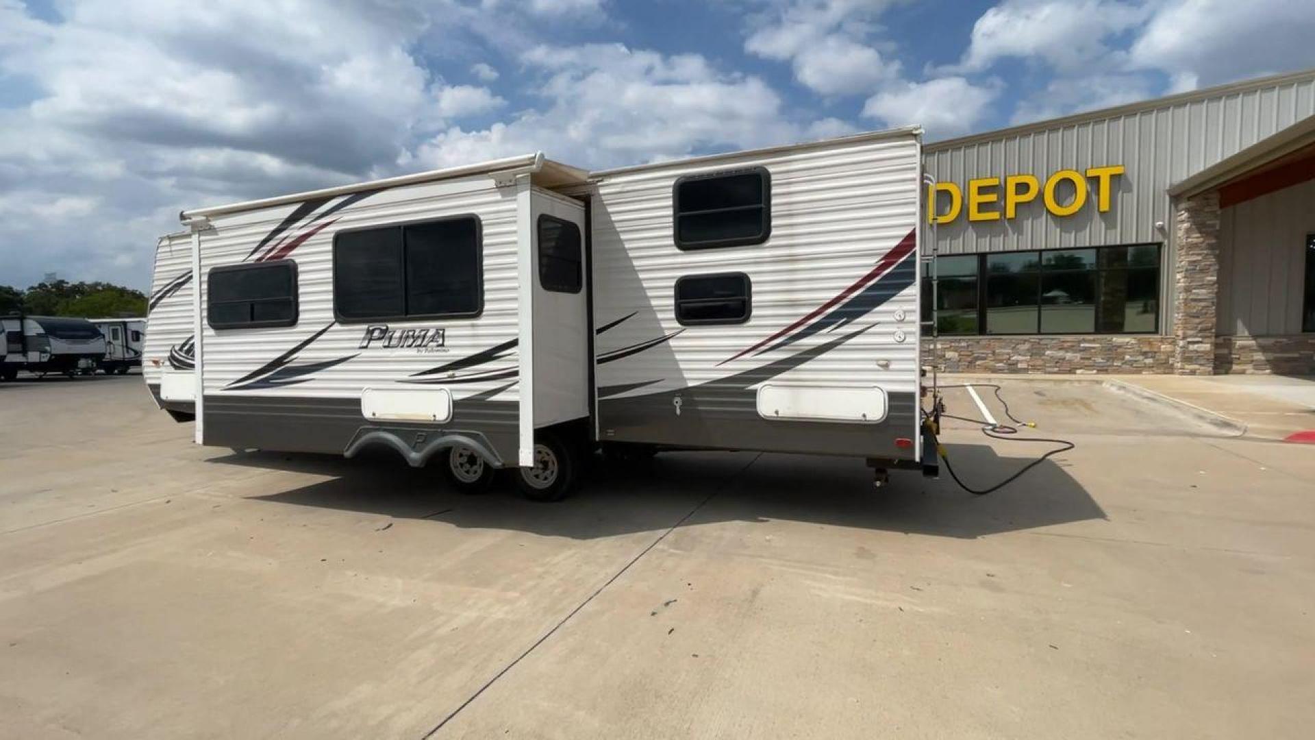 2014 PALOMINO PUMA PT30DBSS (4X4TPUF21EP) , Length: 33.5 ft. | Dry Weight: 6,675 lbs. | Gross Weight: 9,588 lbs. | Slides: 1 transmission, located at 4319 N Main St, Cleburne, TX, 76033, (817) 678-5133, 32.385960, -97.391212 - Photo#7