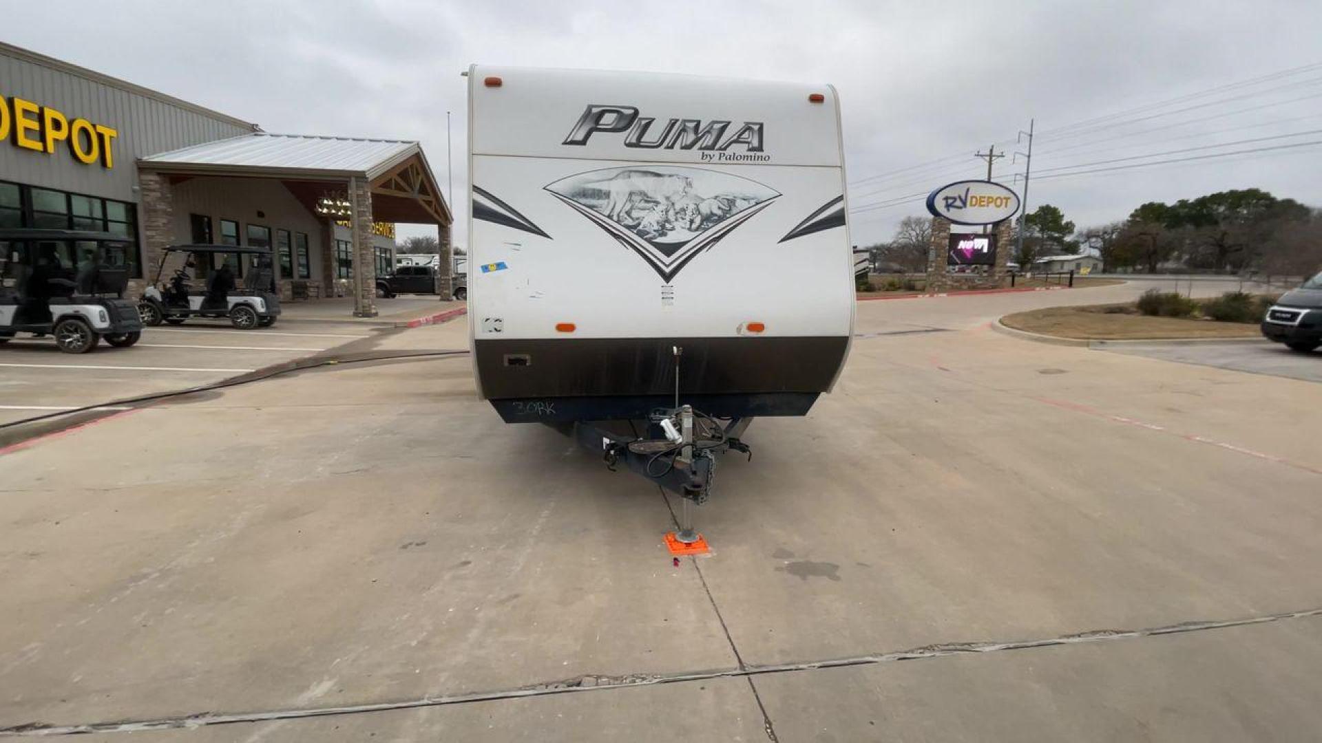 2014 WHITE PUMA 30RKSS (4X4TPUF23EP) , Length: 32.75 ft. | Dry Weight: 6,670 lbs. | Gross Weight: 9,827 lbs. | Slides: 1 transmission, located at 4319 N Main St, Cleburne, TX, 76033, (817) 678-5133, 32.385960, -97.391212 - Looking for a travel trailer that offers comfort, convenience, and style? Look no further than this 2014 PUMA 30RKSS available at RV Depot in Cleburne, TX. With its spacious interior, sleek white exterior, and rear living layout, this travel trailer is perfect for your next adventure. The PUMA 30RK - Photo#4