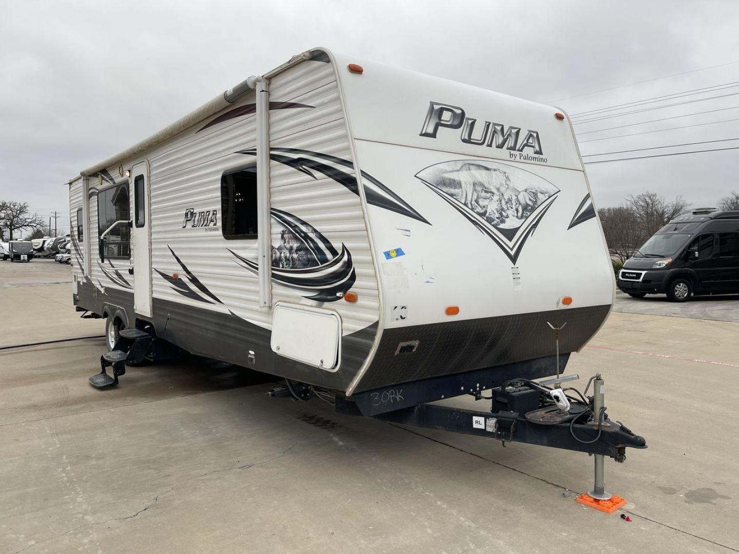 2014 WHITE PUMA 30RKSS (4X4TPUF23EP) , Length: 32.75 ft. | Dry Weight: 6,670 lbs. | Gross Weight: 9,827 lbs. | Slides: 1 transmission, located at 4319 N Main St, Cleburne, TX, 76033, (817) 678-5133, 32.385960, -97.391212 - Looking for a travel trailer that offers comfort, convenience, and style? Look no further than this 2014 PUMA 30RKSS available at RV Depot in Cleburne, TX. With its spacious interior, sleek white exterior, and rear living layout, this travel trailer is perfect for your next adventure. The PUMA 30RK - Photo#22