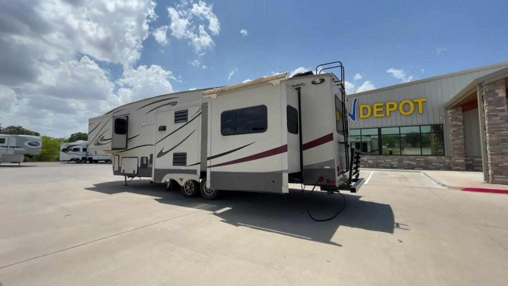 2014 TAN SABRE 34REQS-6 (4X4FSRK2XE3) , Length: 36 ft. | Dry Weight: 10,854 lbs. | Gross Weight: 13,704 lbs. | Slides: 4 transmission, located at 4319 N Main St, Cleburne, TX, 76033, (817) 678-5133, 32.385960, -97.391212 - This RV, which measures 36 feet in length and weighs 10,854 pounds dry, is designed to provide a luxurious and sumptuous living experience when traveling. With a gross weight of 13,704 pounds and four slides, including one in the bedroom, the 2014 Sabre 3REQS-6 Fifth Wheel will allow you plenty of s - Photo#7