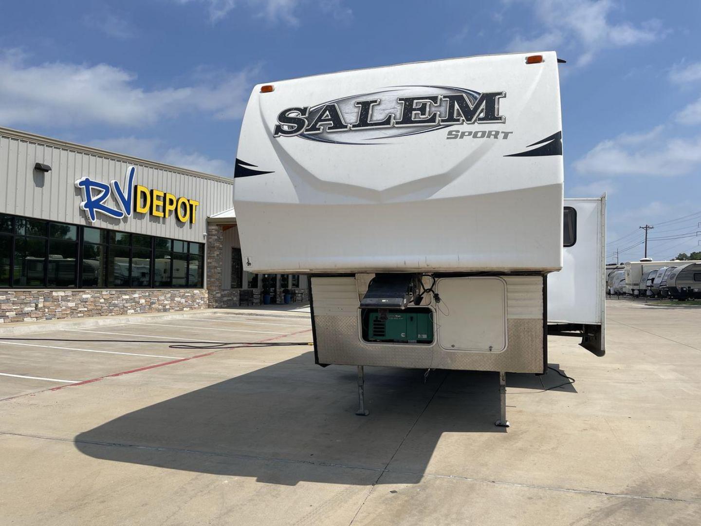 2014 GRAY SALEM 32SRVP - (4X4FSTH29ER) , Length: 34.5 ft. | Dry Weight: 8,198 lbs. | Slides: 1 transmission, located at 4319 N Main St, Cleburne, TX, 76033, (817) 678-5133, 32.385960, -97.391212 - Take advantage of the 2014 Salem 32SRVP Toy Hauler and unleash your sense of adventure. With living space and a designated room for your favorite toys, this tough and adaptable RV is made to fit your outdoor lifestyle. The dimensions of this unit are 34.5 ft in length by 10.08 ft in height. It ha - Photo#0