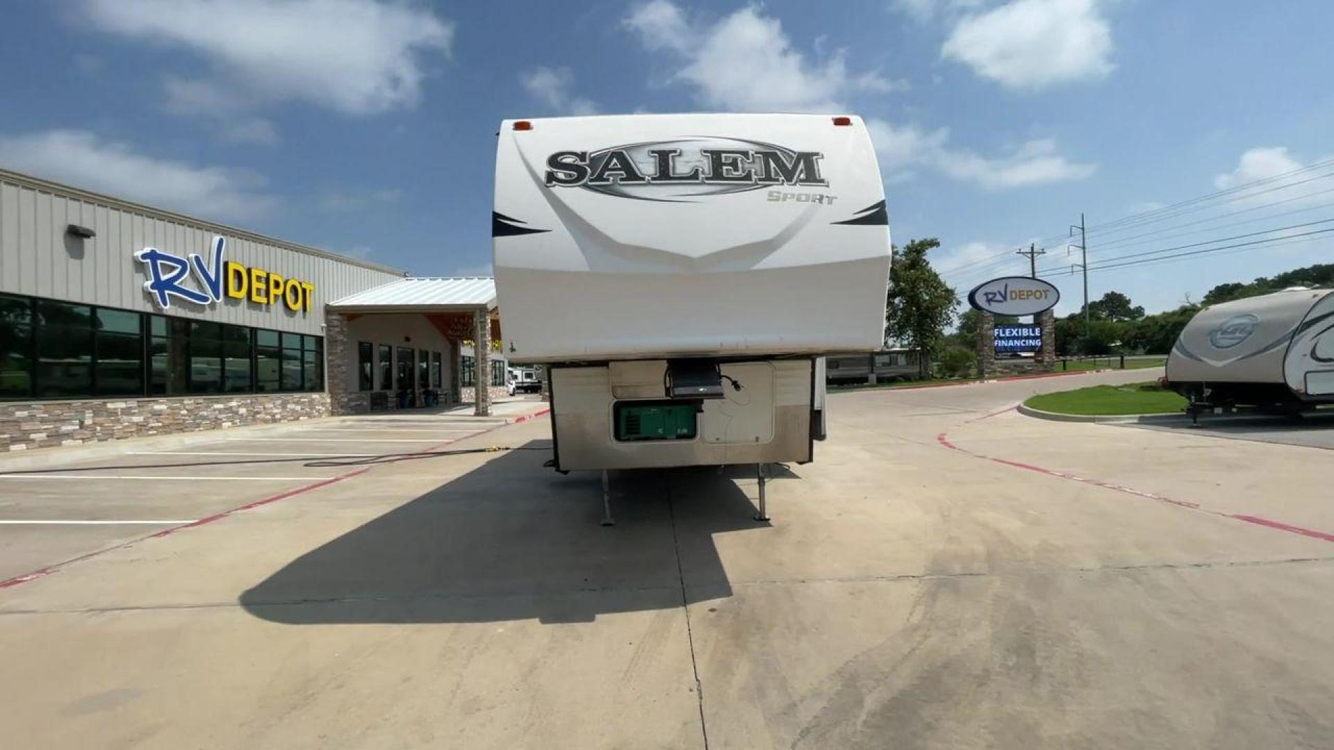 2014 GRAY SALEM 32SRVP - (4X4FSTH29ER) , Length: 34.5 ft. | Dry Weight: 8,198 lbs. | Slides: 1 transmission, located at 4319 N Main St, Cleburne, TX, 76033, (817) 678-5133, 32.385960, -97.391212 - Take advantage of the 2014 Salem 32SRVP Toy Hauler and unleash your sense of adventure. With living space and a designated room for your favorite toys, this tough and adaptable RV is made to fit your outdoor lifestyle. The dimensions of this unit are 34.5 ft in length by 10.08 ft in height. It ha - Photo#4