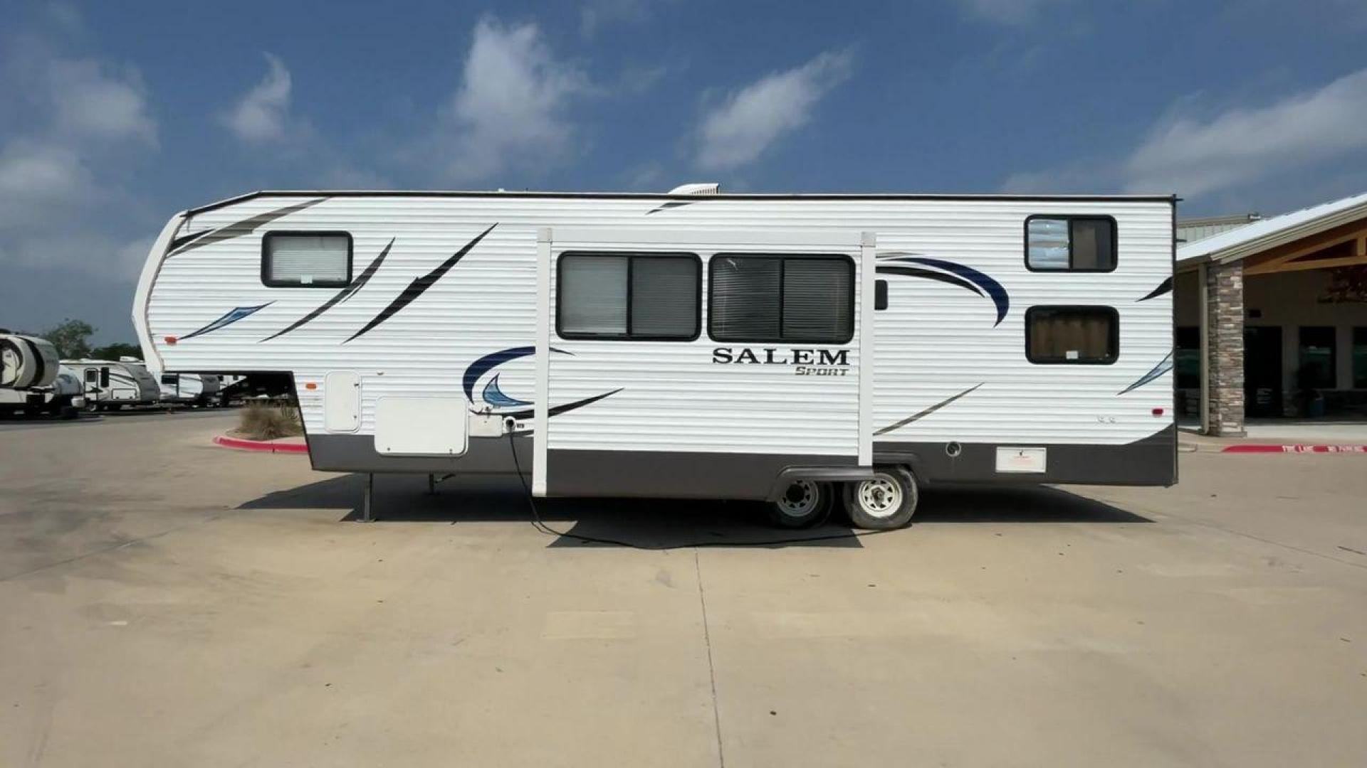 2014 GRAY SALEM 32SRVP - (4X4FSTH29ER) , Length: 34.5 ft. | Dry Weight: 8,198 lbs. | Slides: 1 transmission, located at 4319 N Main St, Cleburne, TX, 76033, (817) 678-5133, 32.385960, -97.391212 - Take advantage of the 2014 Salem 32SRVP Toy Hauler and unleash your sense of adventure. With living space and a designated room for your favorite toys, this tough and adaptable RV is made to fit your outdoor lifestyle. The dimensions of this unit are 34.5 ft in length by 10.08 ft in height. It ha - Photo#6