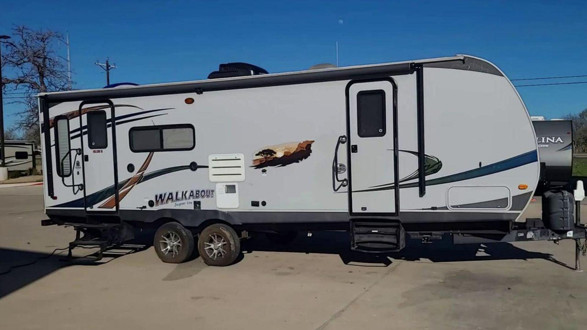 2014 TAN SKYLINE WALKABOUT 26SS - (1SE200M22EC) , Length: 29.25 ft. | Dry Weight: 5,350 lbs. | Slides: 1 transmission, located at 4319 N Main St, Cleburne, TX, 76033, (817) 678-5133, 32.385960, -97.391212 - In this elegantly constructed 2017 Forest River Sandpiper 3250IK Travel Trailer, enjoy comfortable and cozy camping. For those looking for a home away from home during their outdoor activities, this RV offers the ideal balance of comfort, design, and functionality. This trailer measures 29.5 ft in l - Photo#2