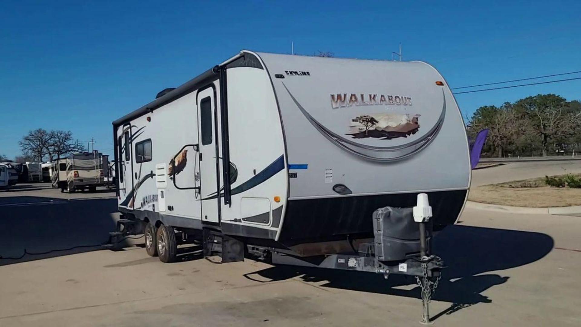 2014 TAN SKYLINE WALKABOUT 26SS - (1SE200M22EC) , Length: 29.25 ft. | Dry Weight: 5,350 lbs. | Slides: 1 transmission, located at 4319 N Main St, Cleburne, TX, 76033, (817) 678-5133, 32.385960, -97.391212 - In this elegantly constructed 2017 Forest River Sandpiper 3250IK Travel Trailer, enjoy comfortable and cozy camping. For those looking for a home away from home during their outdoor activities, this RV offers the ideal balance of comfort, design, and functionality. This trailer measures 29.5 ft in l - Photo#3