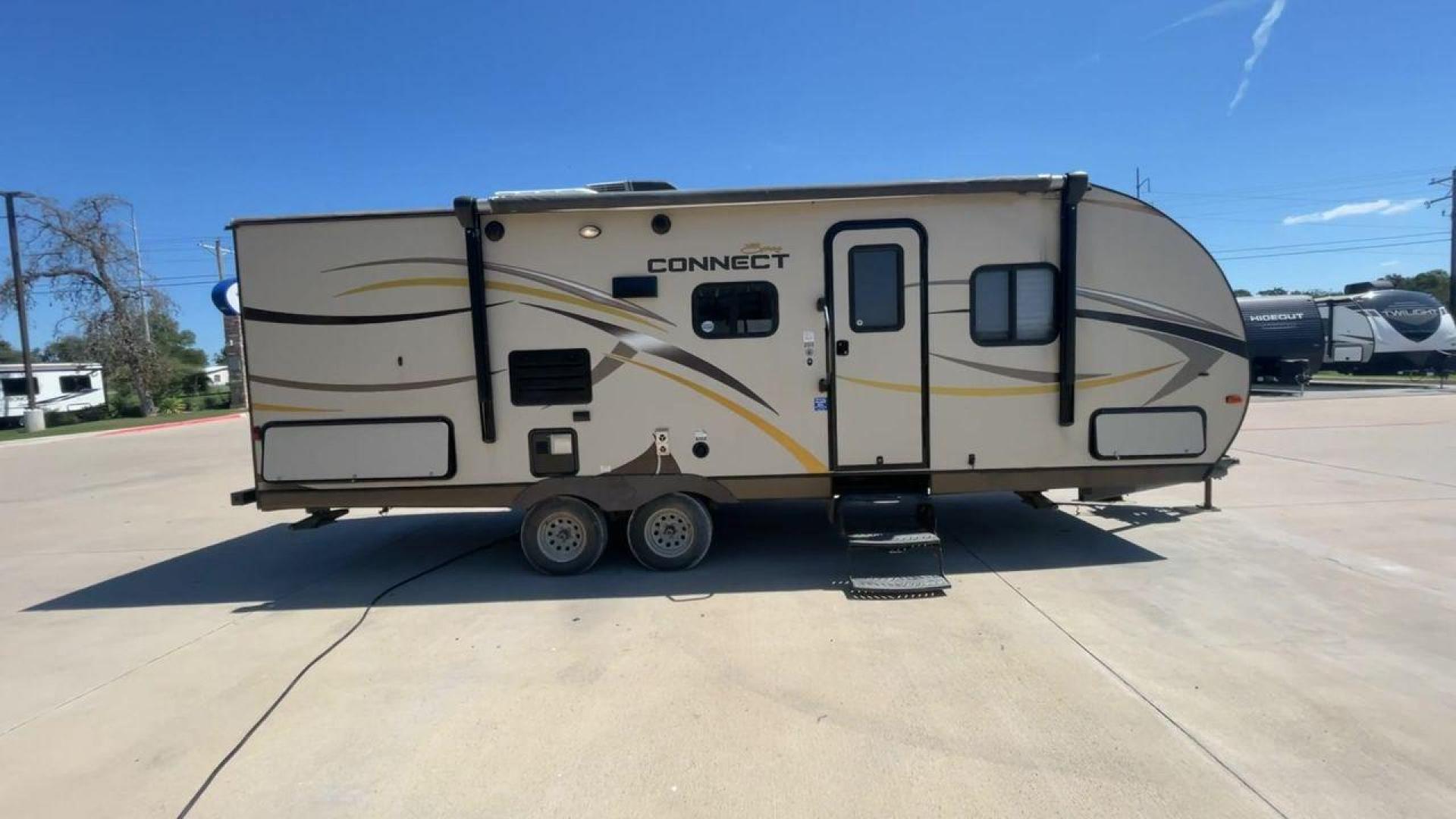 2014 TAN SPREE CONNECT 250BHS (4EZTL2524E8) , Slides: 1 transmission, located at 4319 N Main St, Cleburne, TX, 76033, (817) 678-5133, 32.385960, -97.391212 - The 2014 Spree Connect 250BHS travel trailer lets you go on trips you'll never forget. It's the best place to stay away from home because it has a single slide-out and a roomy inside. When you step inside the Spree Connect 250BHS, you'll find a warm and welcoming space. There are a set of bunk beds - Photo#2