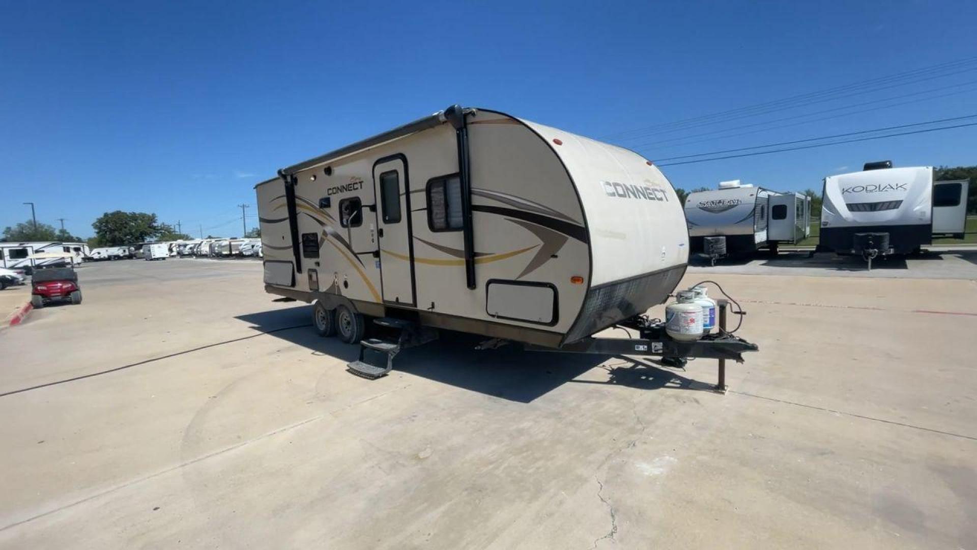 2014 TAN SPREE CONNECT 250BHS (4EZTL2524E8) , Slides: 1 transmission, located at 4319 N Main St, Cleburne, TX, 76033, (817) 678-5133, 32.385960, -97.391212 - The 2014 Spree Connect 250BHS travel trailer lets you go on trips you'll never forget. It's the best place to stay away from home because it has a single slide-out and a roomy inside. When you step inside the Spree Connect 250BHS, you'll find a warm and welcoming space. There are a set of bunk beds - Photo#3