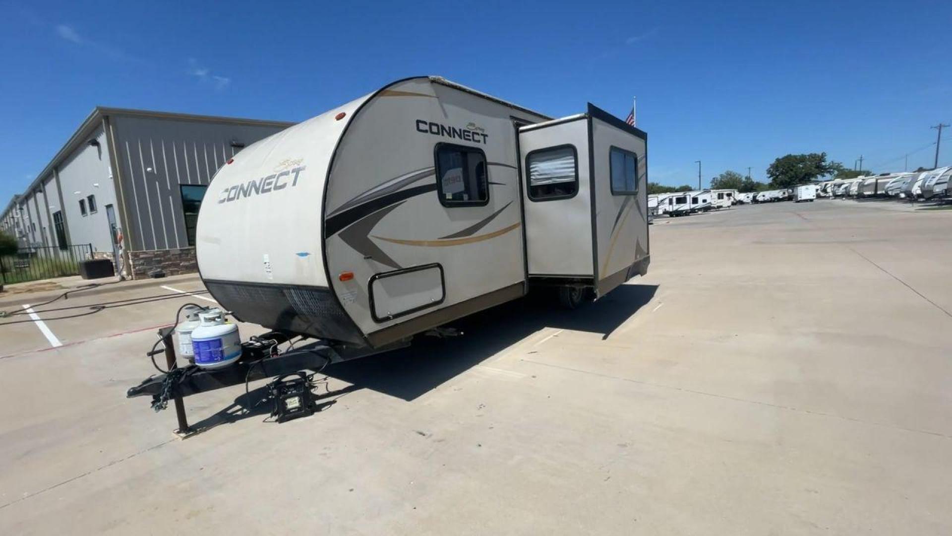 2014 TAN SPREE CONNECT 250BHS (4EZTL2524E8) , Slides: 1 transmission, located at 4319 N Main St, Cleburne, TX, 76033, (817) 678-5133, 32.385960, -97.391212 - The 2014 Spree Connect 250BHS travel trailer lets you go on trips you'll never forget. It's the best place to stay away from home because it has a single slide-out and a roomy inside. When you step inside the Spree Connect 250BHS, you'll find a warm and welcoming space. There are a set of bunk beds - Photo#5