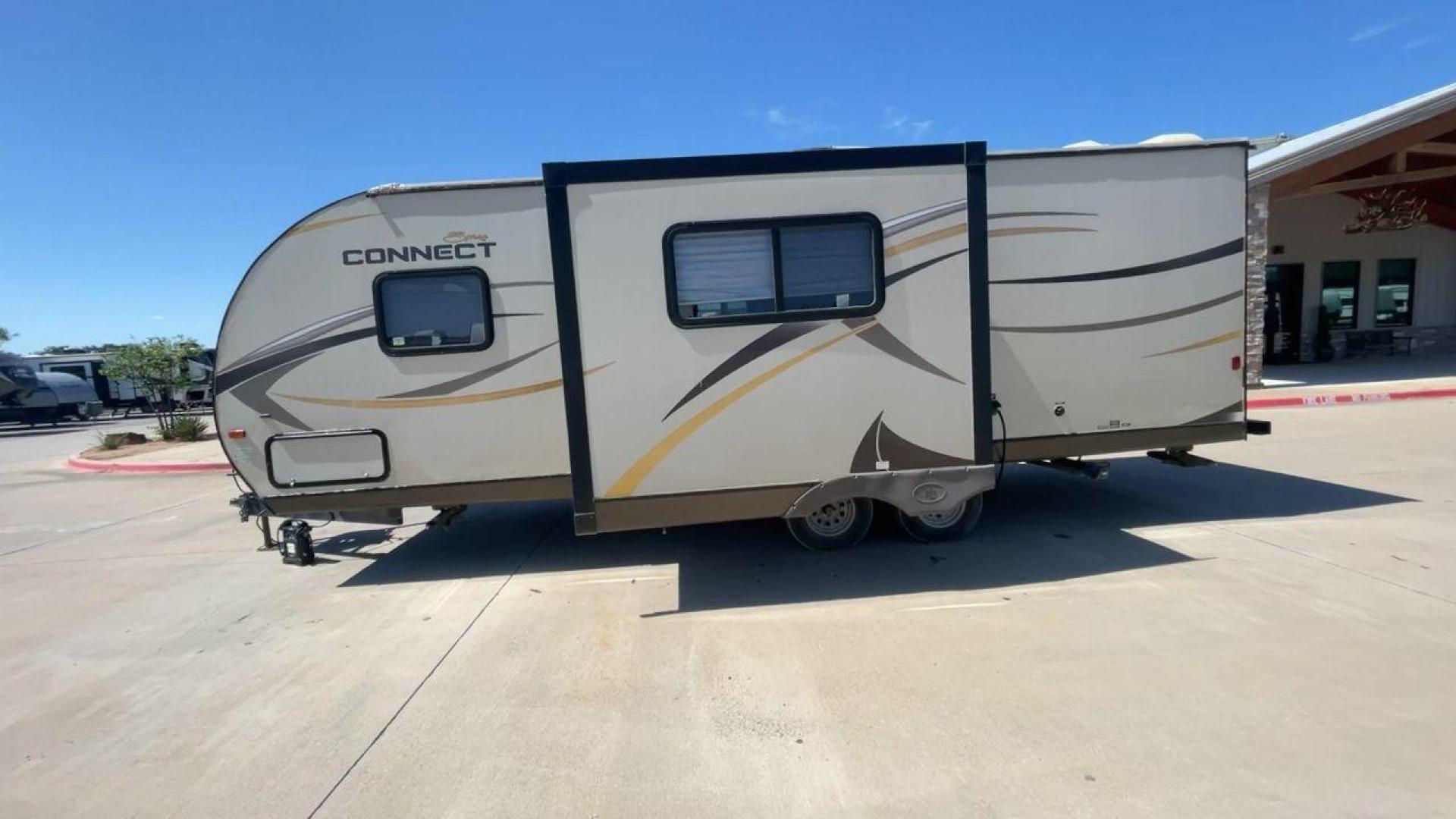 2014 TAN SPREE CONNECT 250BHS (4EZTL2524E8) , Slides: 1 transmission, located at 4319 N Main St, Cleburne, TX, 76033, (817) 678-5133, 32.385960, -97.391212 - The 2014 Spree Connect 250BHS travel trailer lets you go on trips you'll never forget. It's the best place to stay away from home because it has a single slide-out and a roomy inside. When you step inside the Spree Connect 250BHS, you'll find a warm and welcoming space. There are a set of bunk beds - Photo#6