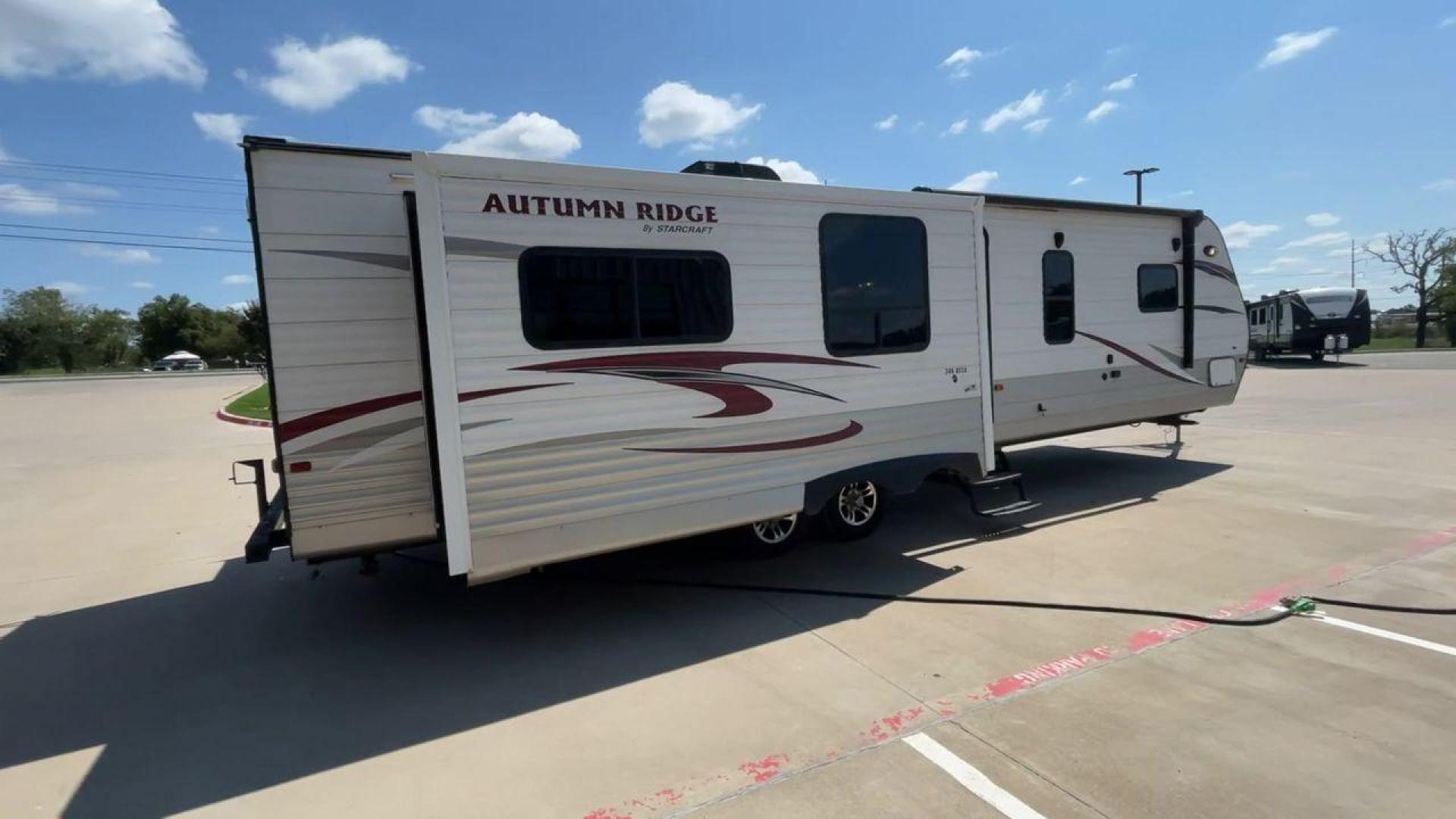 2014 WHITE STARCRAFT AUTUMN RIDGE346 RESA (1SABS0BU0E2) , Length: 38.25 ft. | Dry Weight: 8,385 lbs. | Gross Weight: 10,750 lbs. | Slides: 3 transmission, located at 4319 N Main St, Cleburne, TX, 76033, (817) 678-5133, 32.385960, -97.391212 - With the 2014 Starcraft Autumn Ridge 346RESA travel trailer, you can unleash your inner explorer. For your outdoor adventures, this finely built and feature-rich RV is intended to bring you a cozy and delightful home away from home. This trailer has dimensions of 38.25 ft in length, 8 ft in width, a - Photo#1