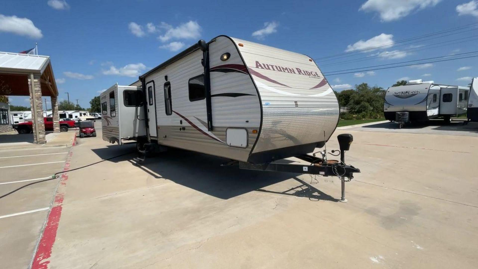 2014 WHITE STARCRAFT AUTUMN RIDGE346 RESA (1SABS0BU0E2) , Length: 38.25 ft. | Dry Weight: 8,385 lbs. | Gross Weight: 10,750 lbs. | Slides: 3 transmission, located at 4319 N Main St, Cleburne, TX, 76033, (817) 678-5133, 32.385960, -97.391212 - With the 2014 Starcraft Autumn Ridge 346RESA travel trailer, you can unleash your inner explorer. For your outdoor adventures, this finely built and feature-rich RV is intended to bring you a cozy and delightful home away from home. This trailer has dimensions of 38.25 ft in length, 8 ft in width, a - Photo#3