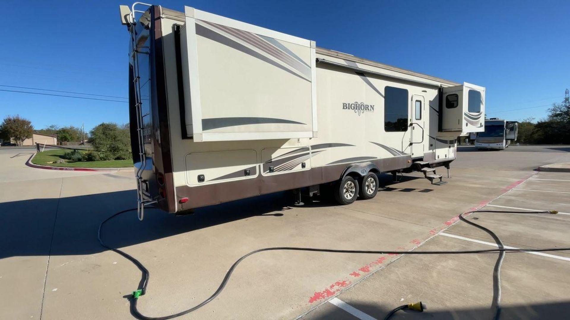 2015 TAN BIGHORN 3750FL (5SFBG4323FE) , Length: 41.7 ft. | Gross Weight: 16,000 lbs. | Slides: 5 transmission, located at 4319 N Main St, Cleburne, TX, 76033, (817) 678-5133, 32.385960, -97.391212 - Photo#1