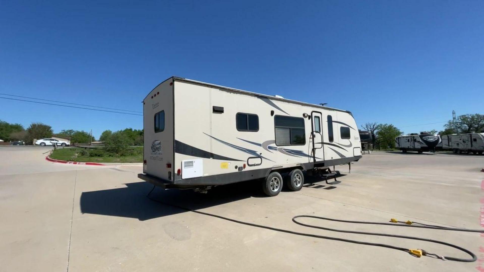 2015 WHITE COACHMEN FREEDOM EXPRESS 305R (5ZT2FEWB3FA) , Length: 34.5 ft | Dry Weight: 6,199 lbs | Gross Weight: 9,500 lbs | Slides: 2 transmission, located at 4319 N Main St, Cleburne, TX, 76033, (817) 678-5133, 32.385960, -97.391212 - Photo#1