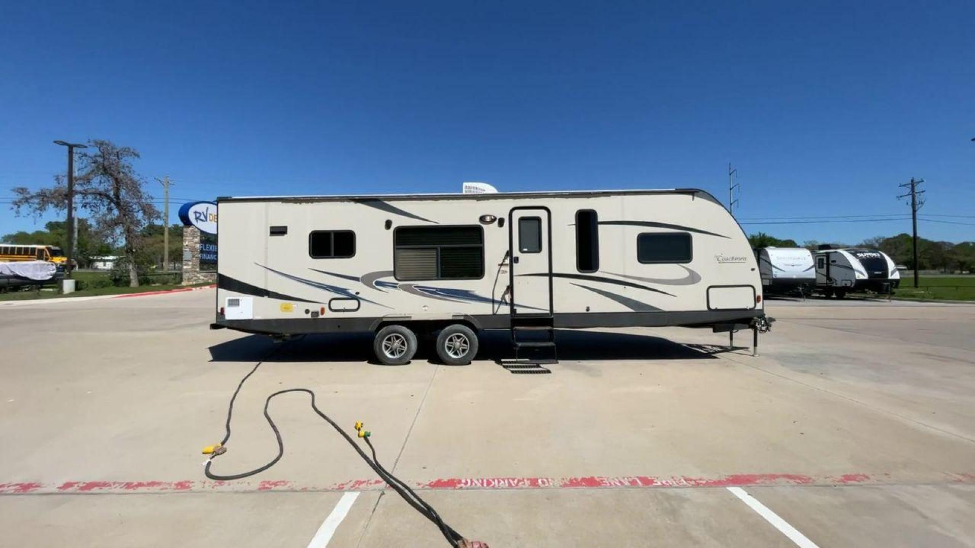 2015 WHITE COACHMEN FREEDOM EXPRESS 305R (5ZT2FEWB3FA) , Length: 34.5 ft | Dry Weight: 6,199 lbs | Gross Weight: 9,500 lbs | Slides: 2 transmission, located at 4319 N Main St, Cleburne, TX, 76033, (817) 678-5133, 32.385960, -97.391212 - Photo#2