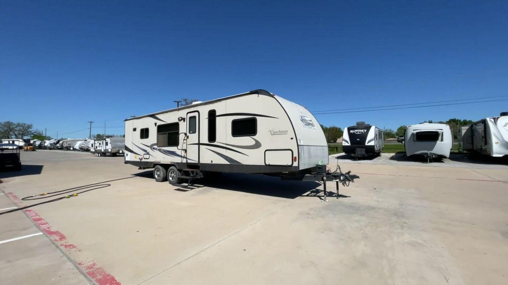 2015 WHITE COACHMEN FREEDOM EXPRESS 305R (5ZT2FEWB3FA) , Length: 34.5 ft | Dry Weight: 6,199 lbs | Gross Weight: 9,500 lbs | Slides: 2 transmission, located at 4319 N Main St, Cleburne, TX, 76033, (817) 678-5133, 32.385960, -97.391212 - Photo#3